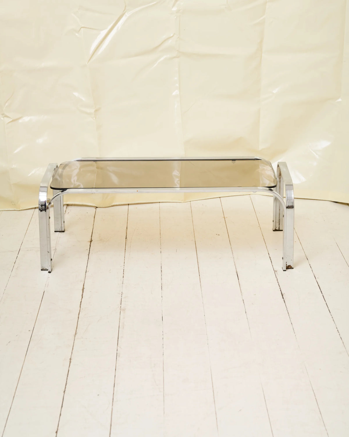 Coffee table with chrome legs and corners