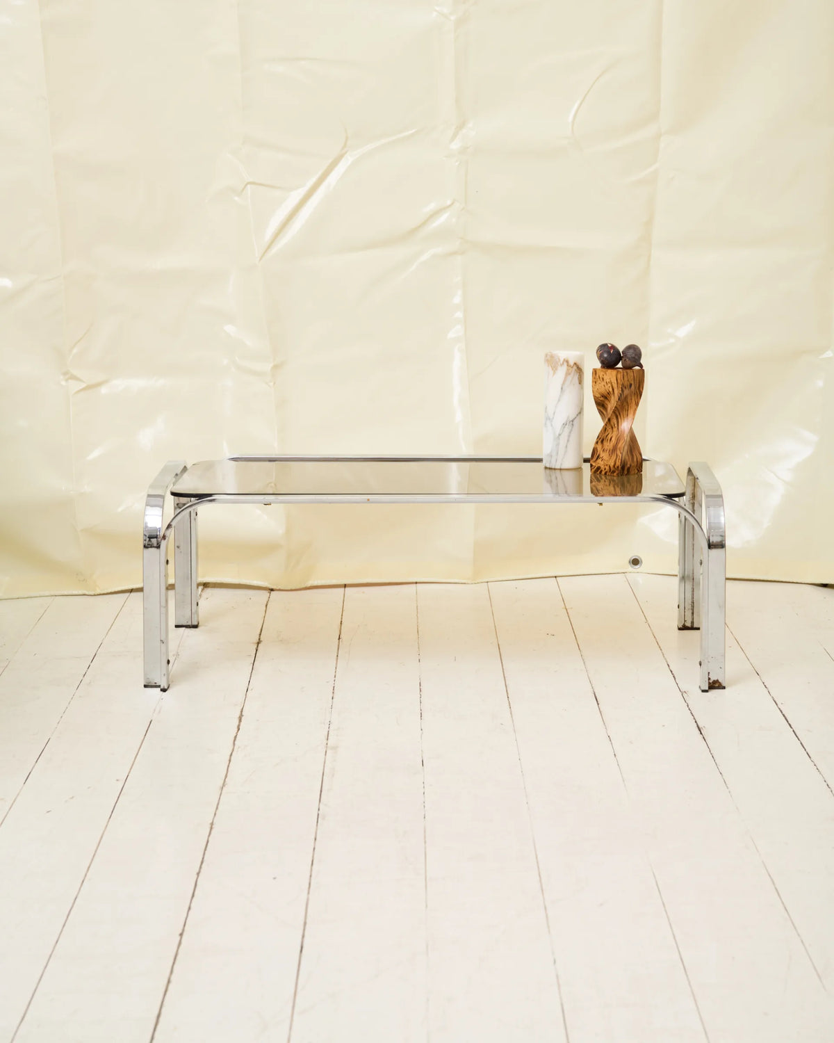 Coffee table with chrome legs and corners