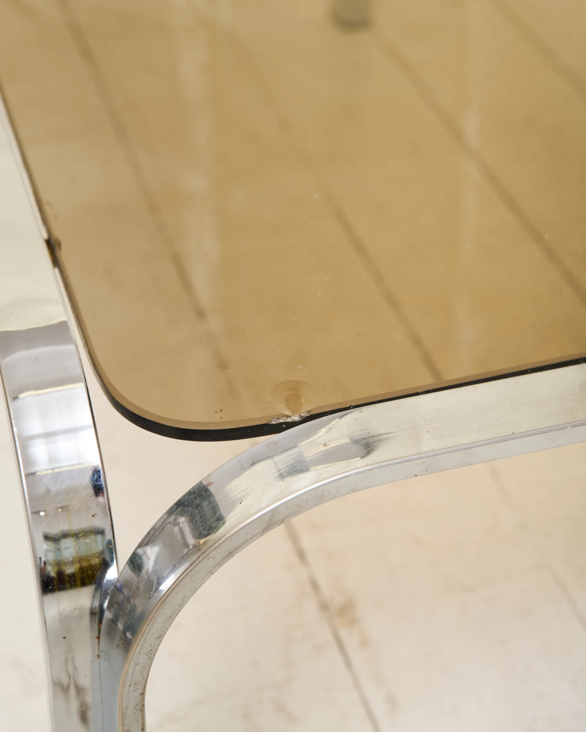 Coffee table with chrome legs and corners