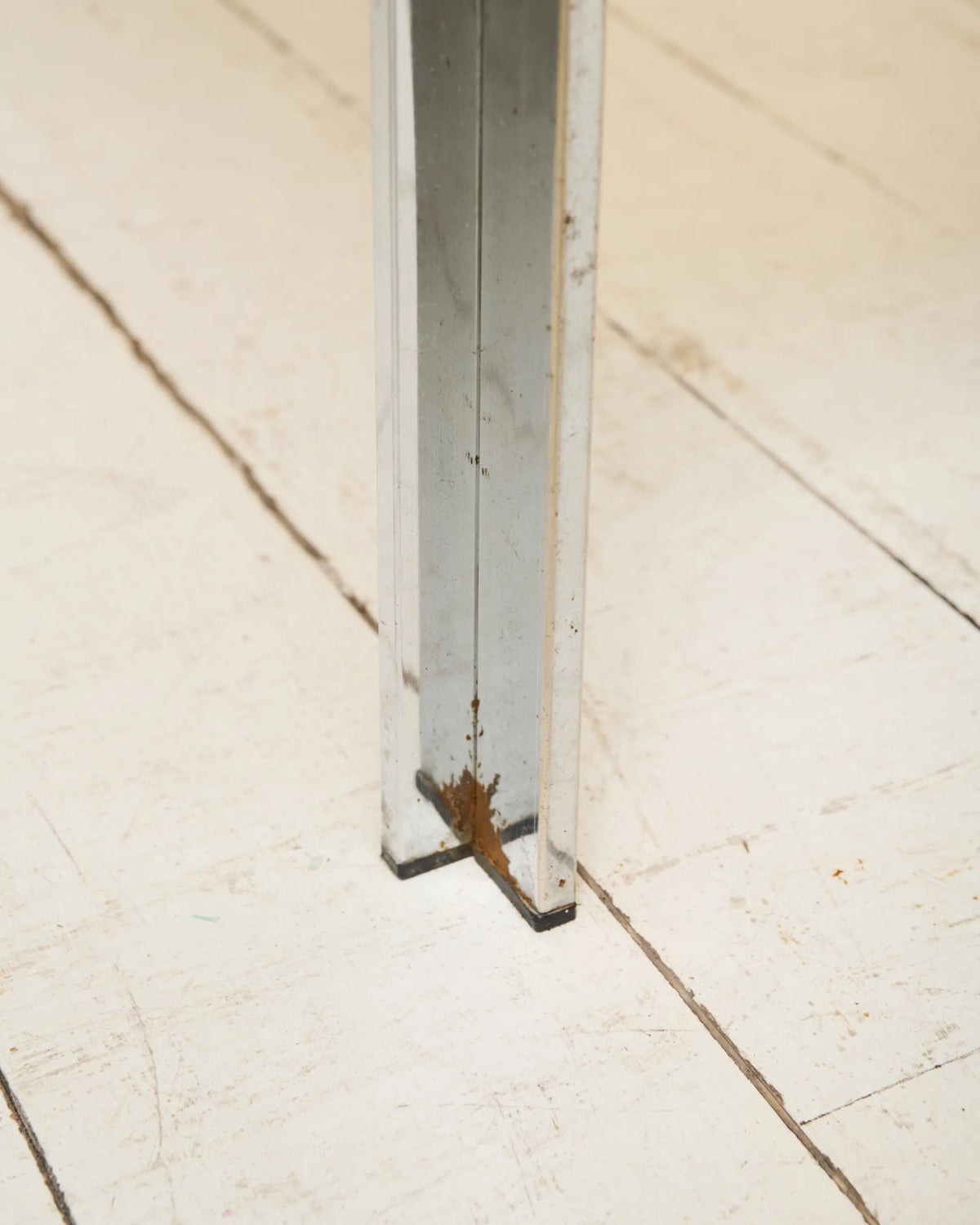 Coffee table with chrome legs and corners