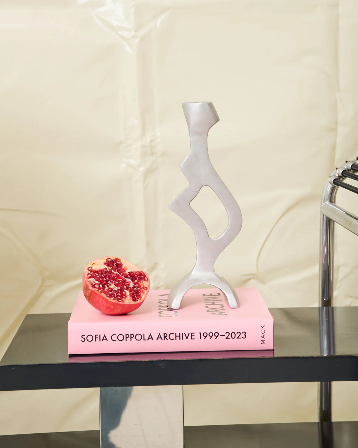 Sculptural cast aluminum candlestick, 1990s
