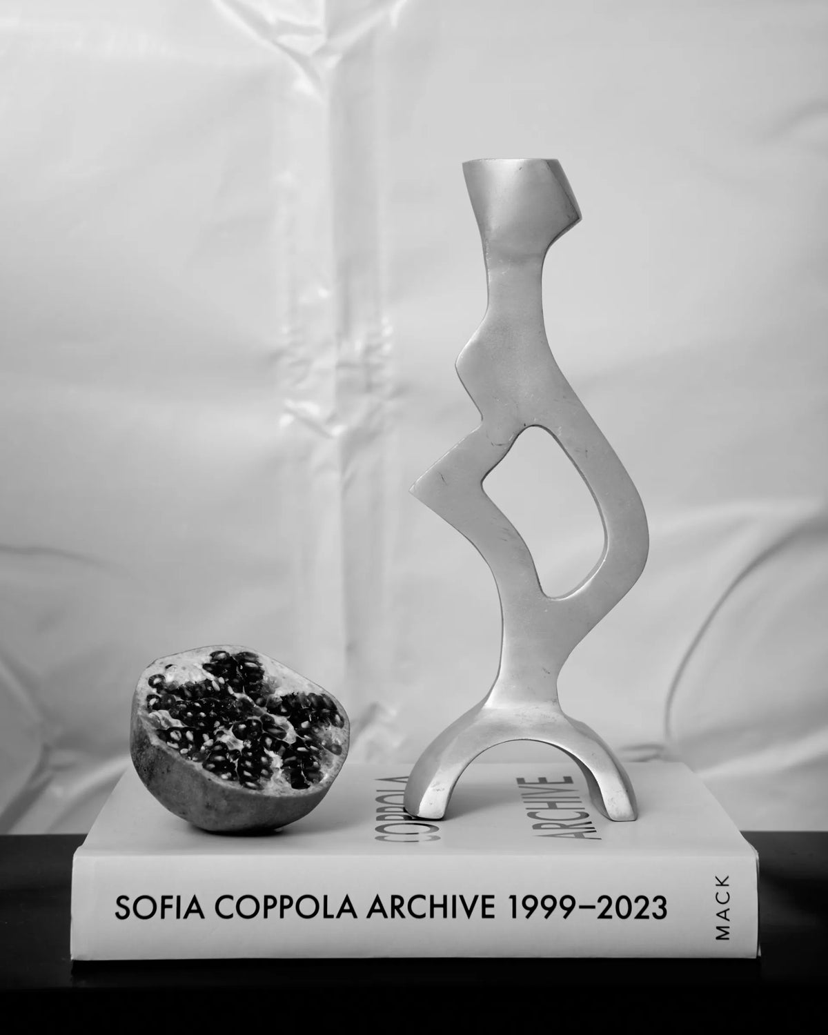 Sculptural cast aluminum candlestick, 1990s