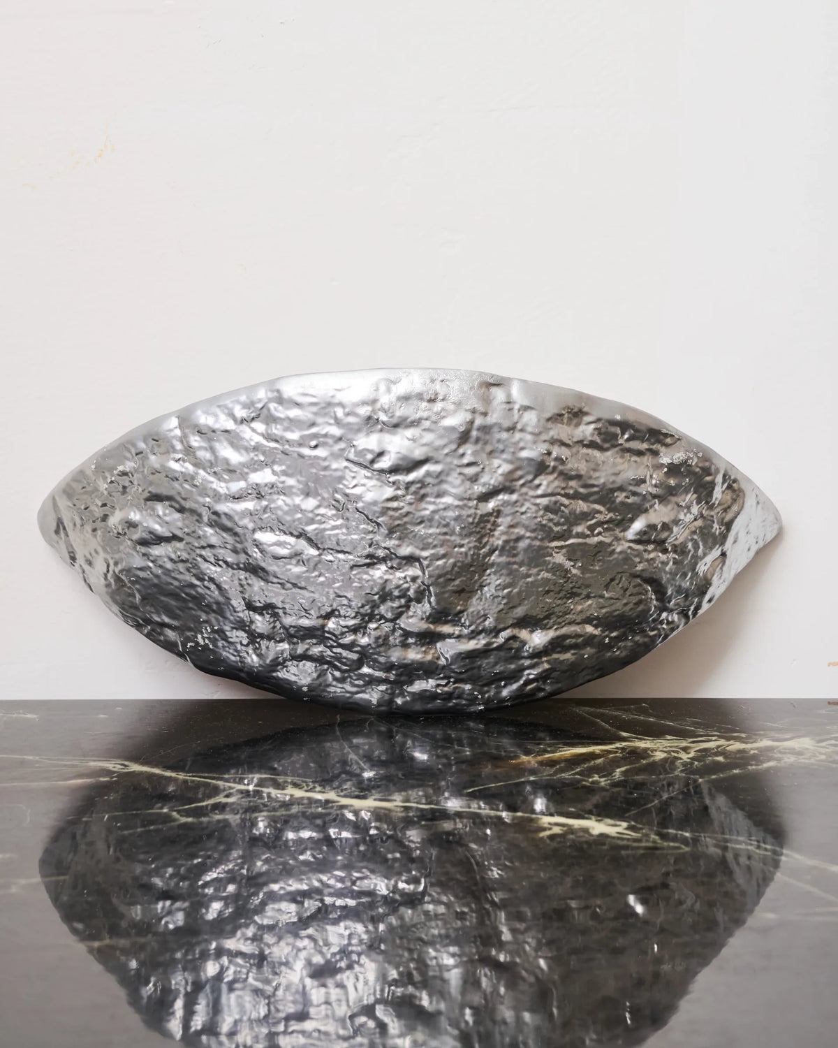 Organic silvered ceramic wall light, France, 1970-1980
