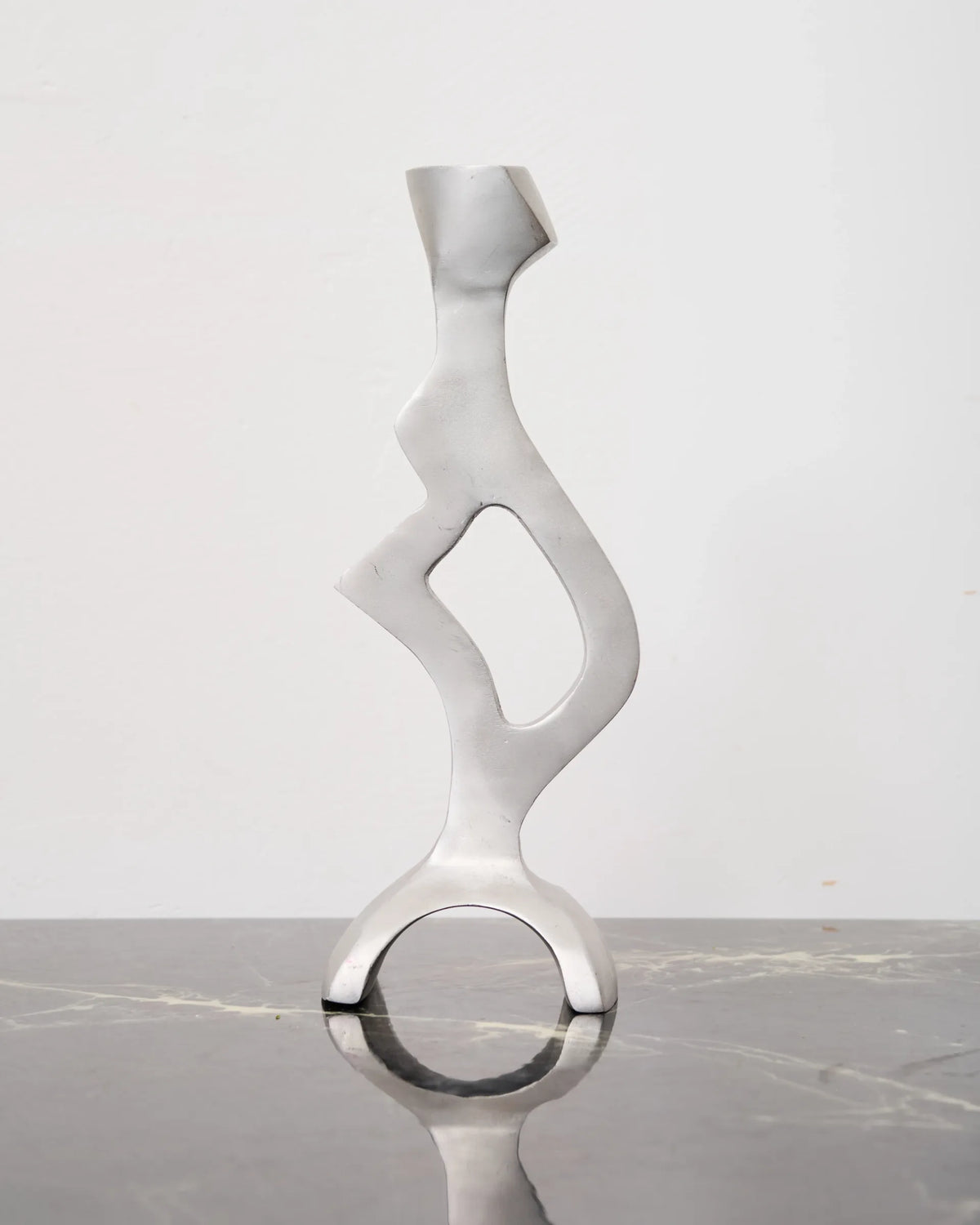Sculptural cast aluminum candlestick, 1990s