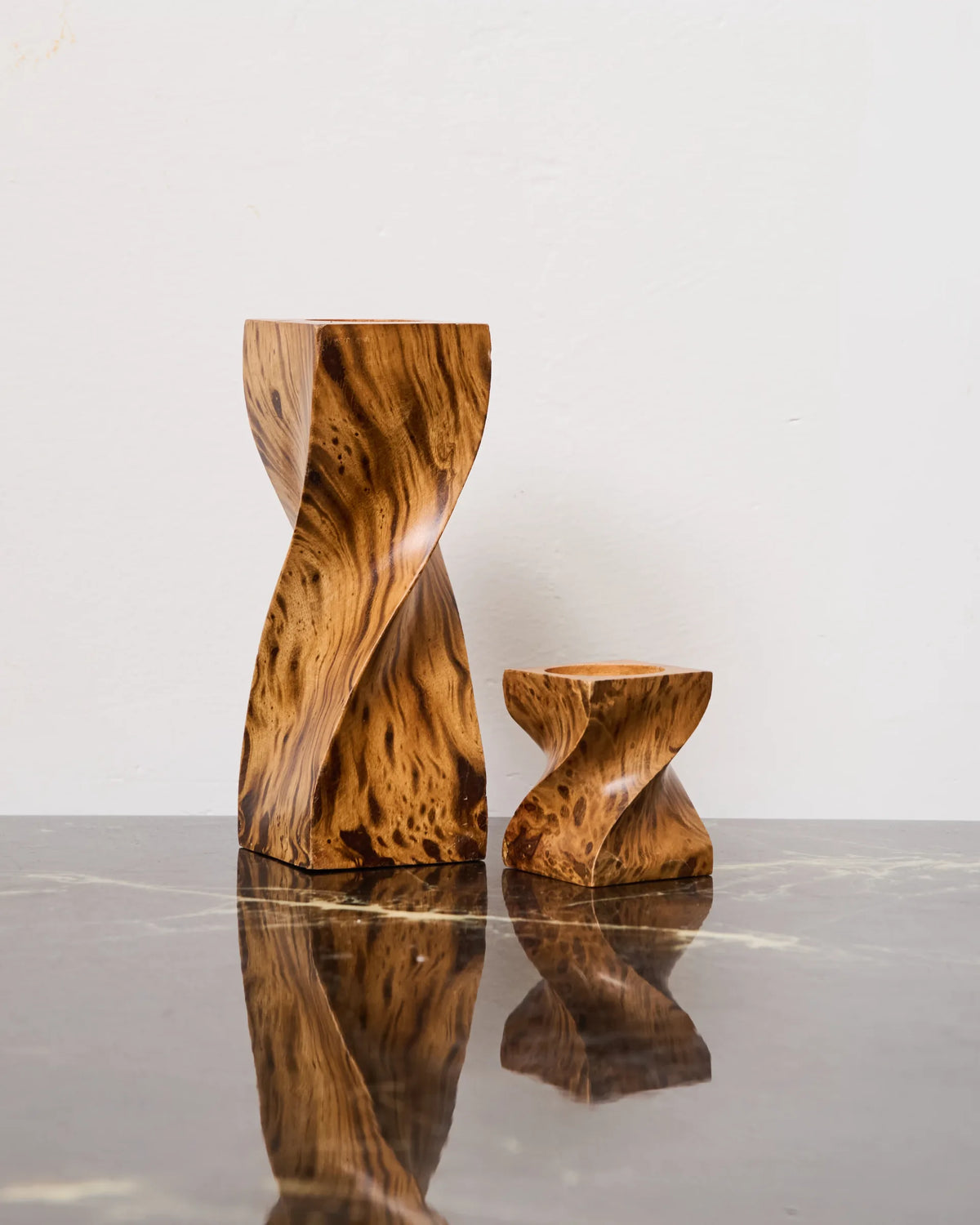 Pair of twisted wood candlesticks, 1970s