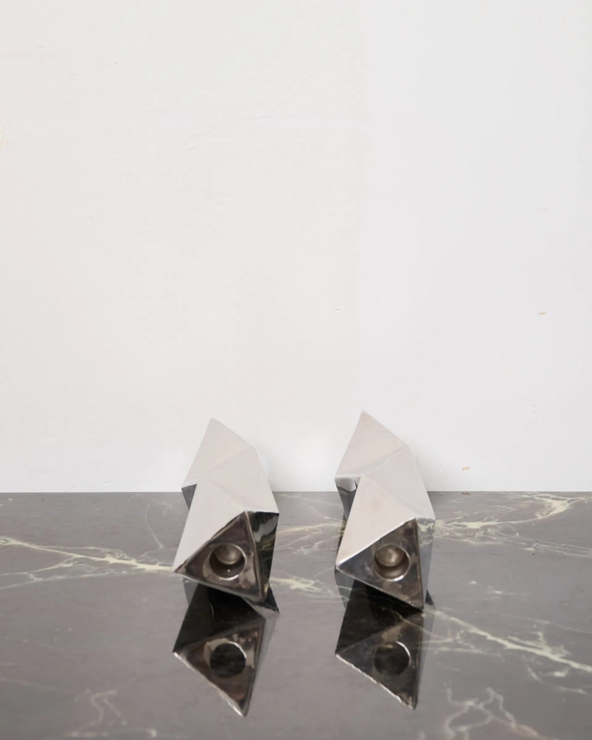 Pair of "Wave" candlesticks in cast aluminum, 1970s