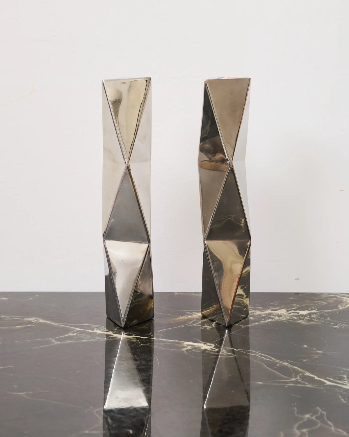 Pair of "Wave" candlesticks in cast aluminum, 1970s