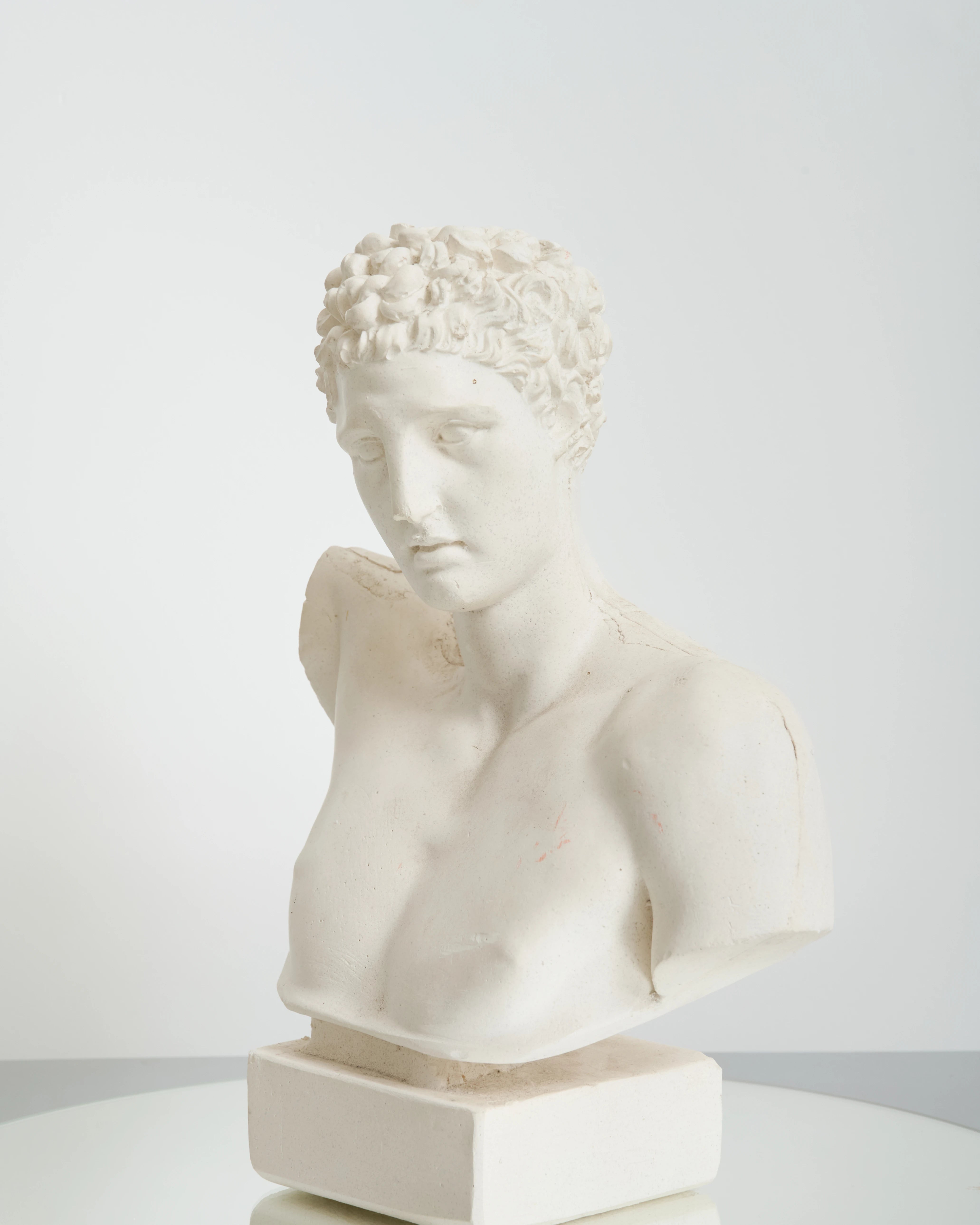 Bust of an Ephebe or Marathon Boy with a plaster base, Italy