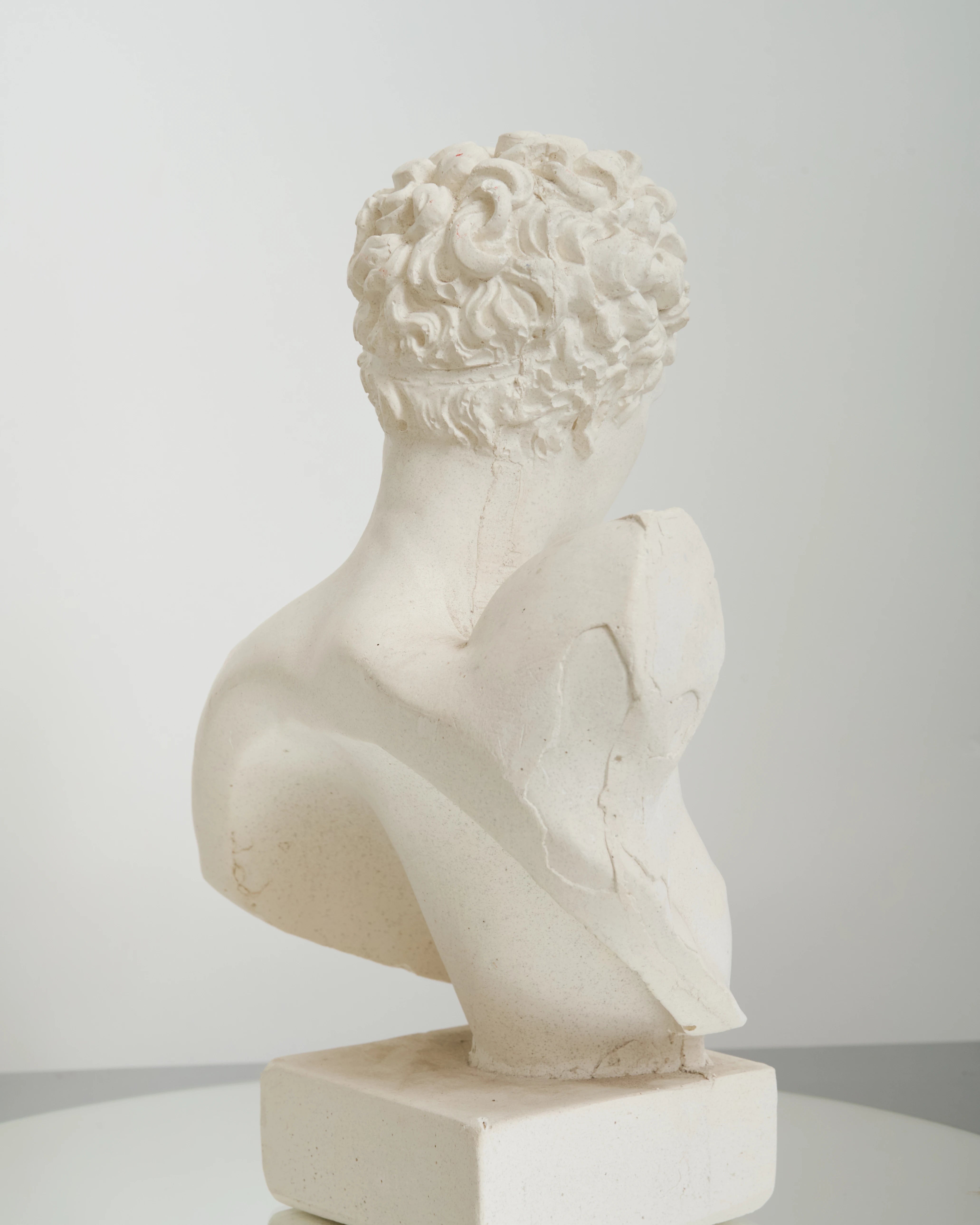 Bust of an Ephebe or Marathon Boy with a plaster base, Italy
