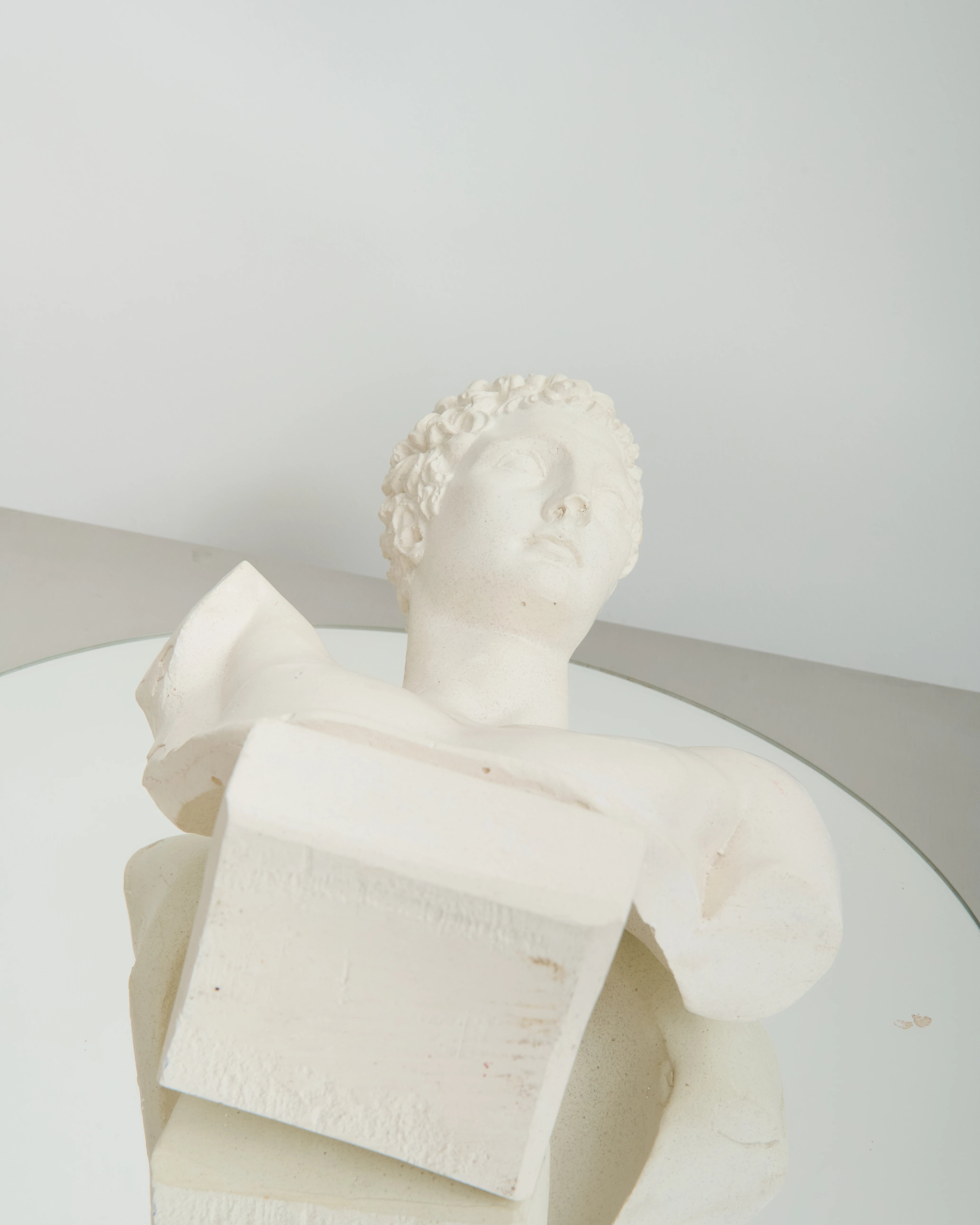 Bust of an Ephebe or Marathon Boy with a plaster base, Italy