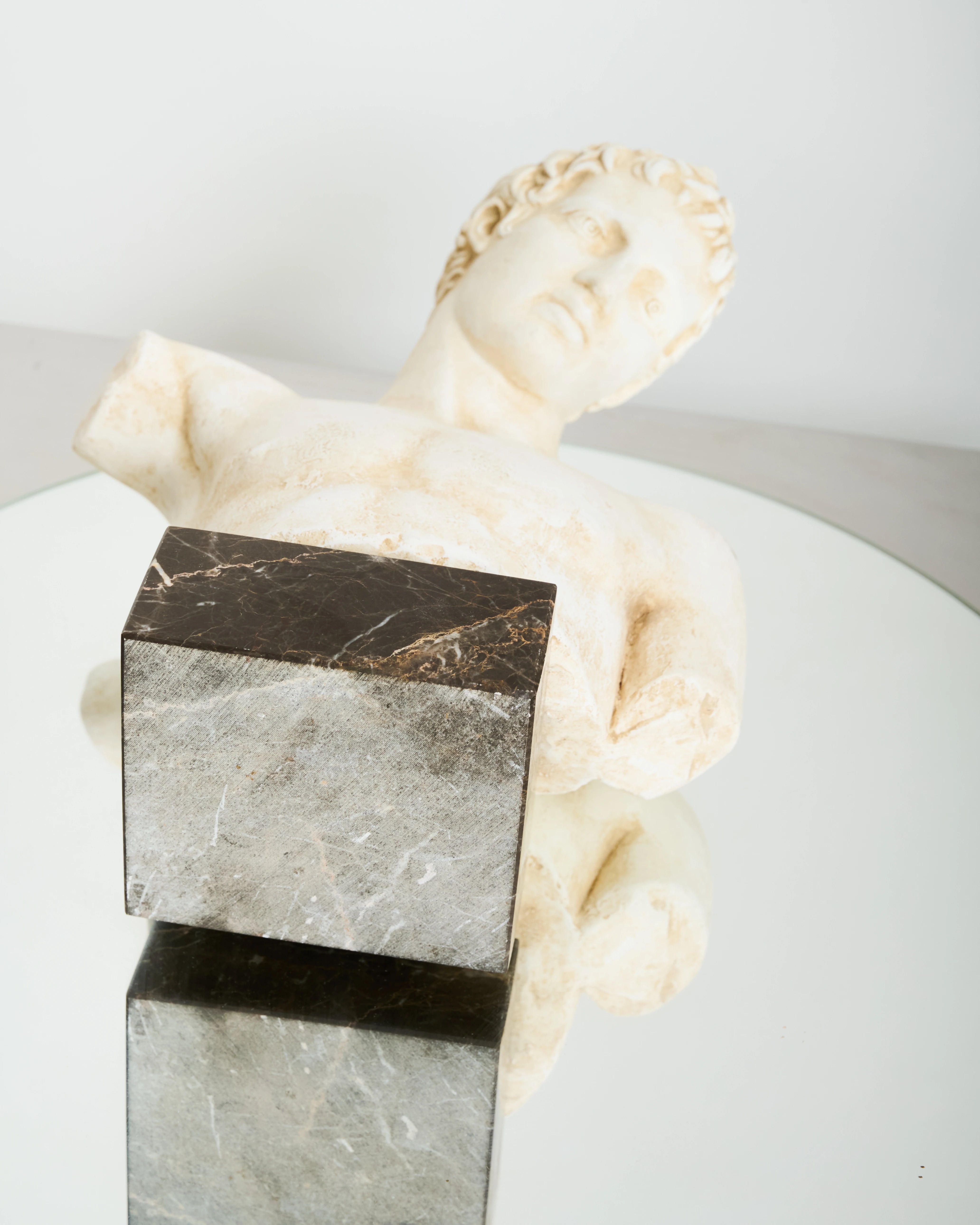 Bust of an Ephebe or Marathon Boy with a marble base, Italy