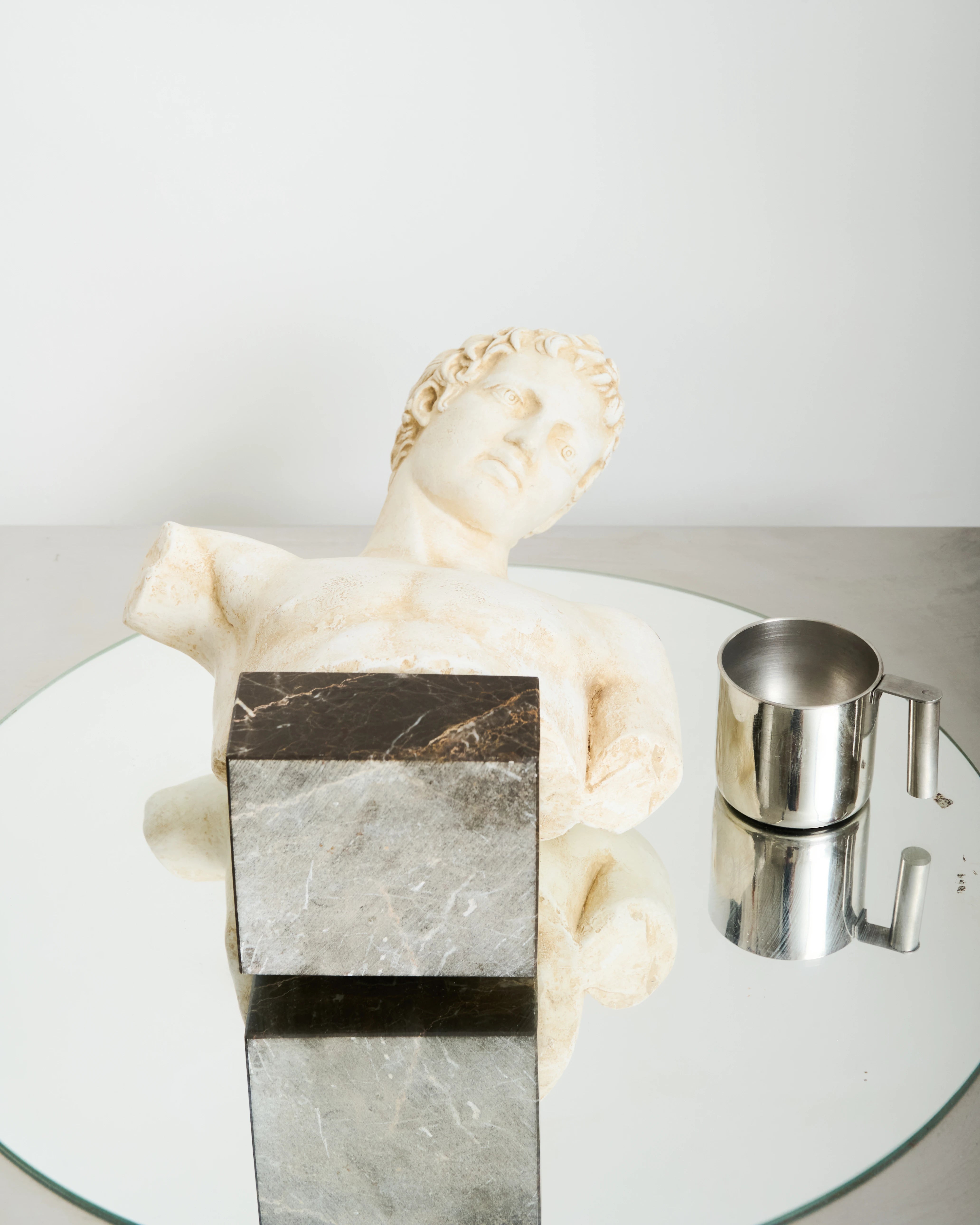 Bust of an Ephebe or Marathon Boy with a marble base, Italy