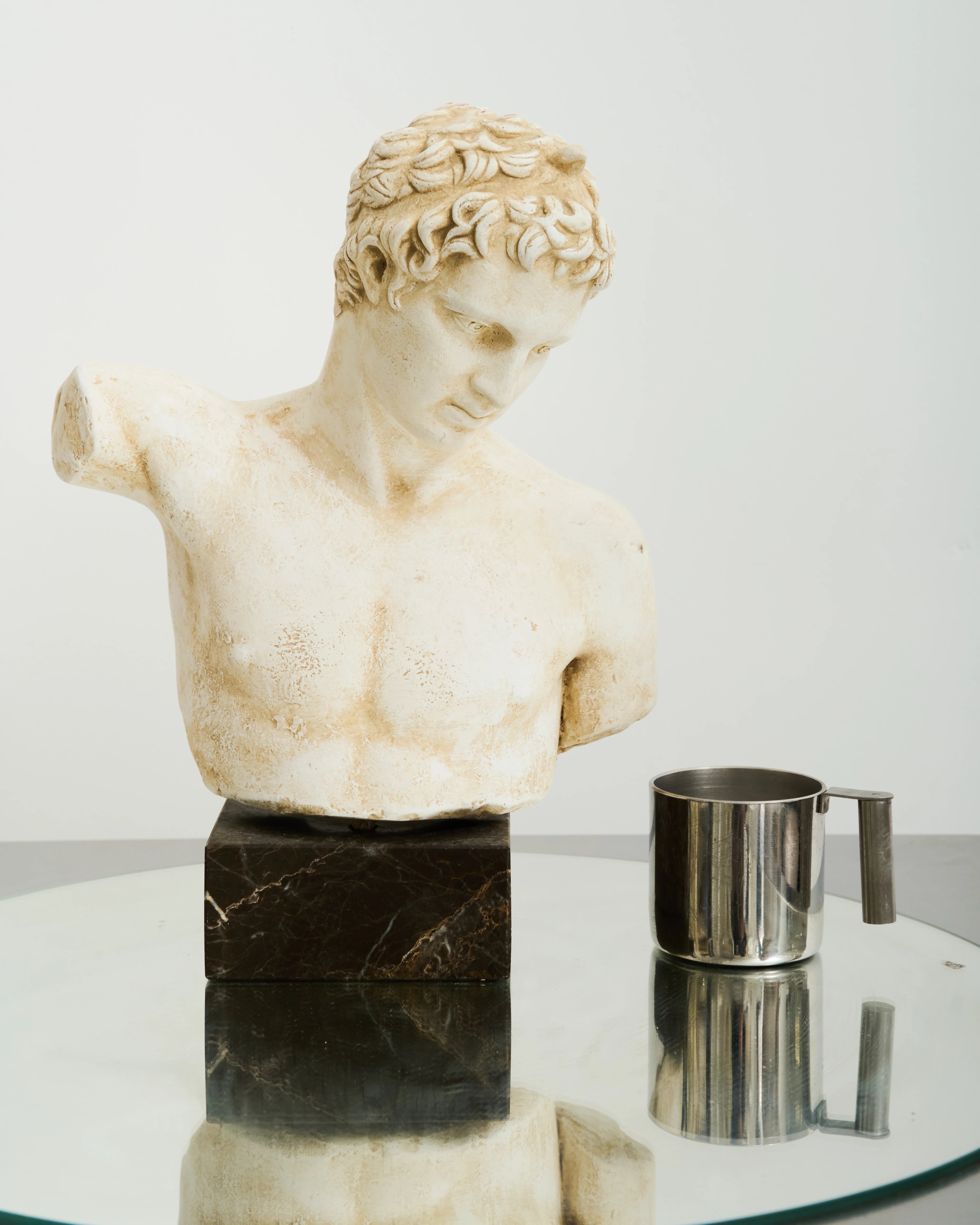 Bust of an Ephebe or Marathon Boy with a marble base, Italy