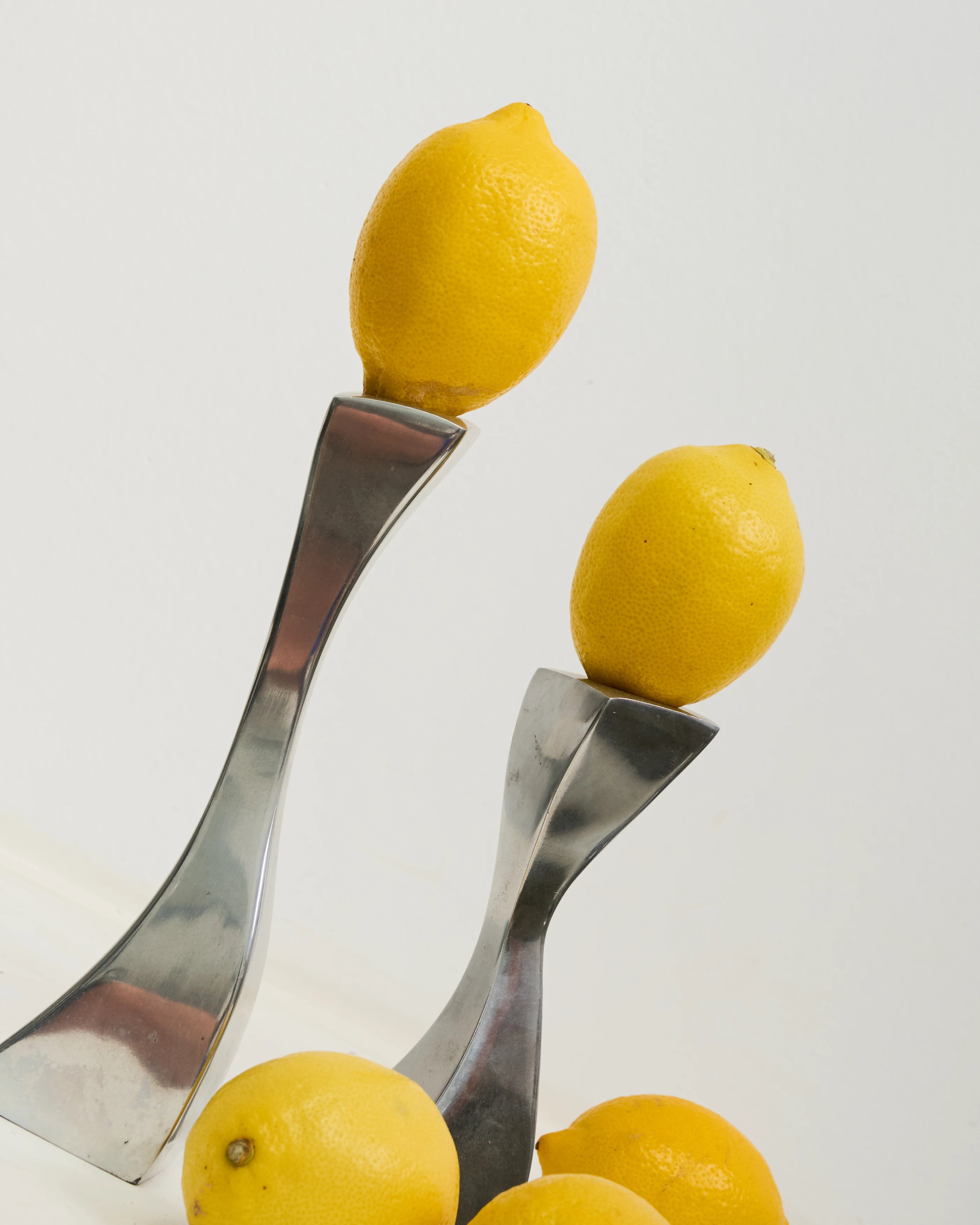 Pair of "Wave" candlesticks in cast aluminum, 1970s