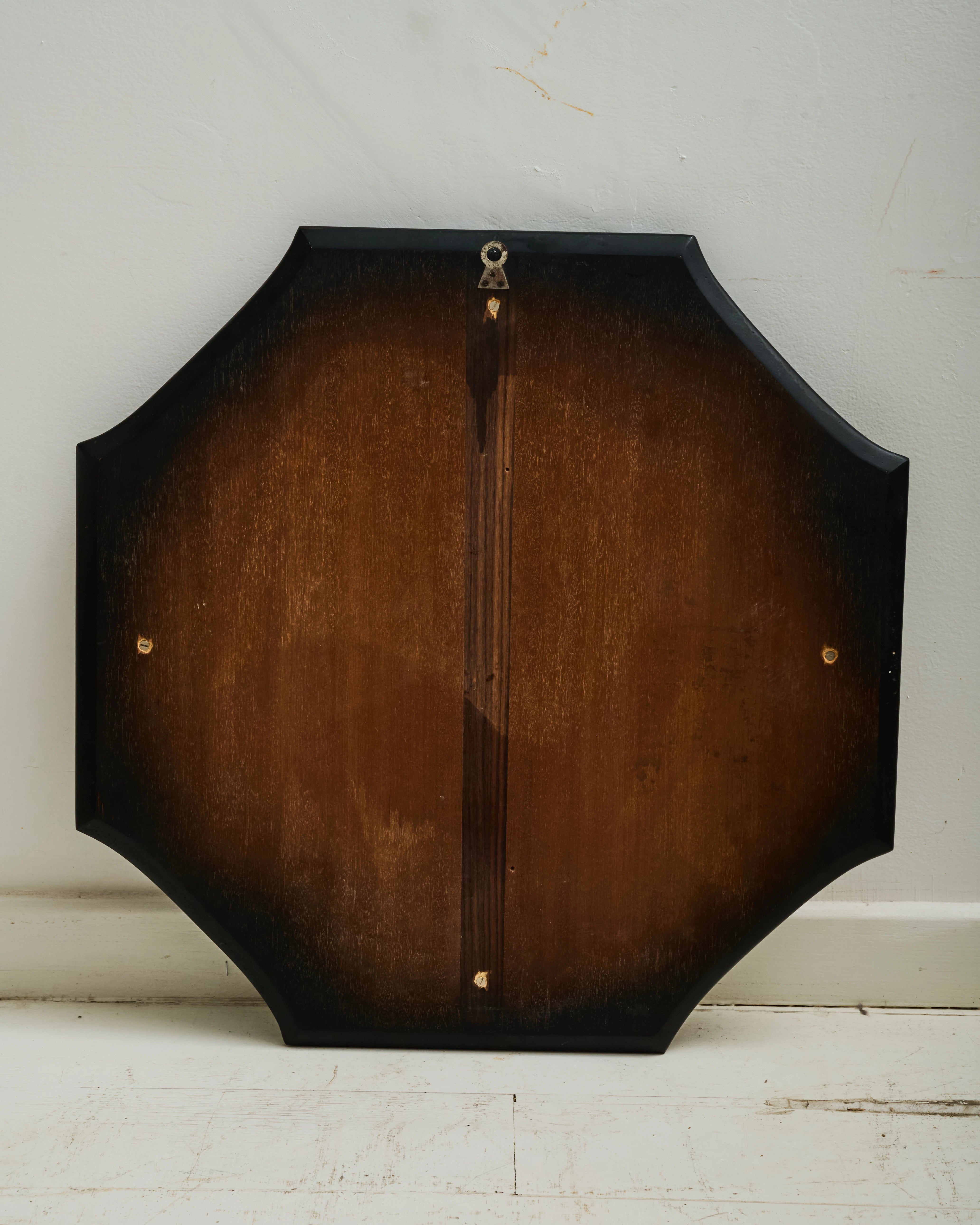 Octagonal rosewood mirror with white inserts, Italy, 1970-1980