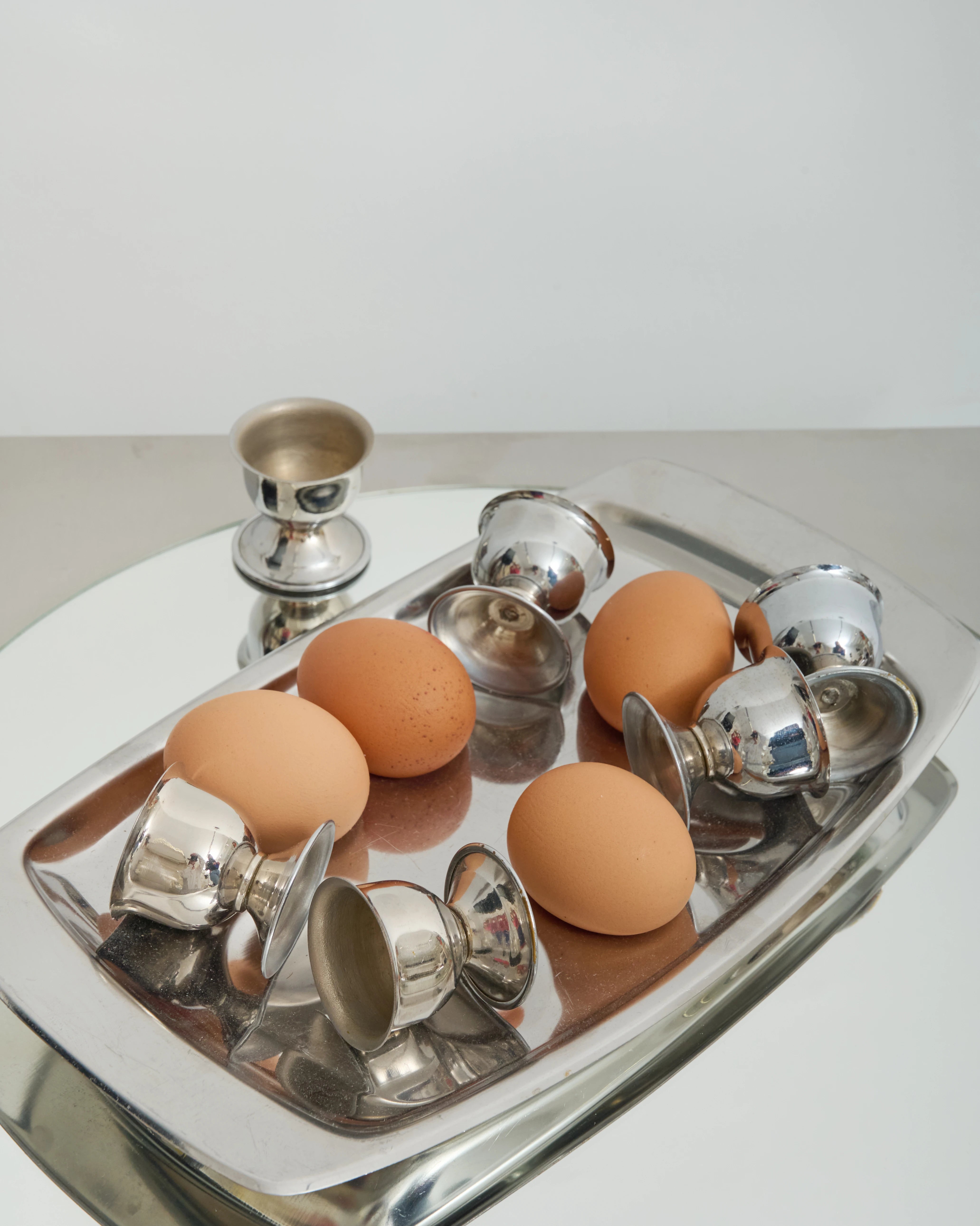 Stainless steel egg stand and egg cups