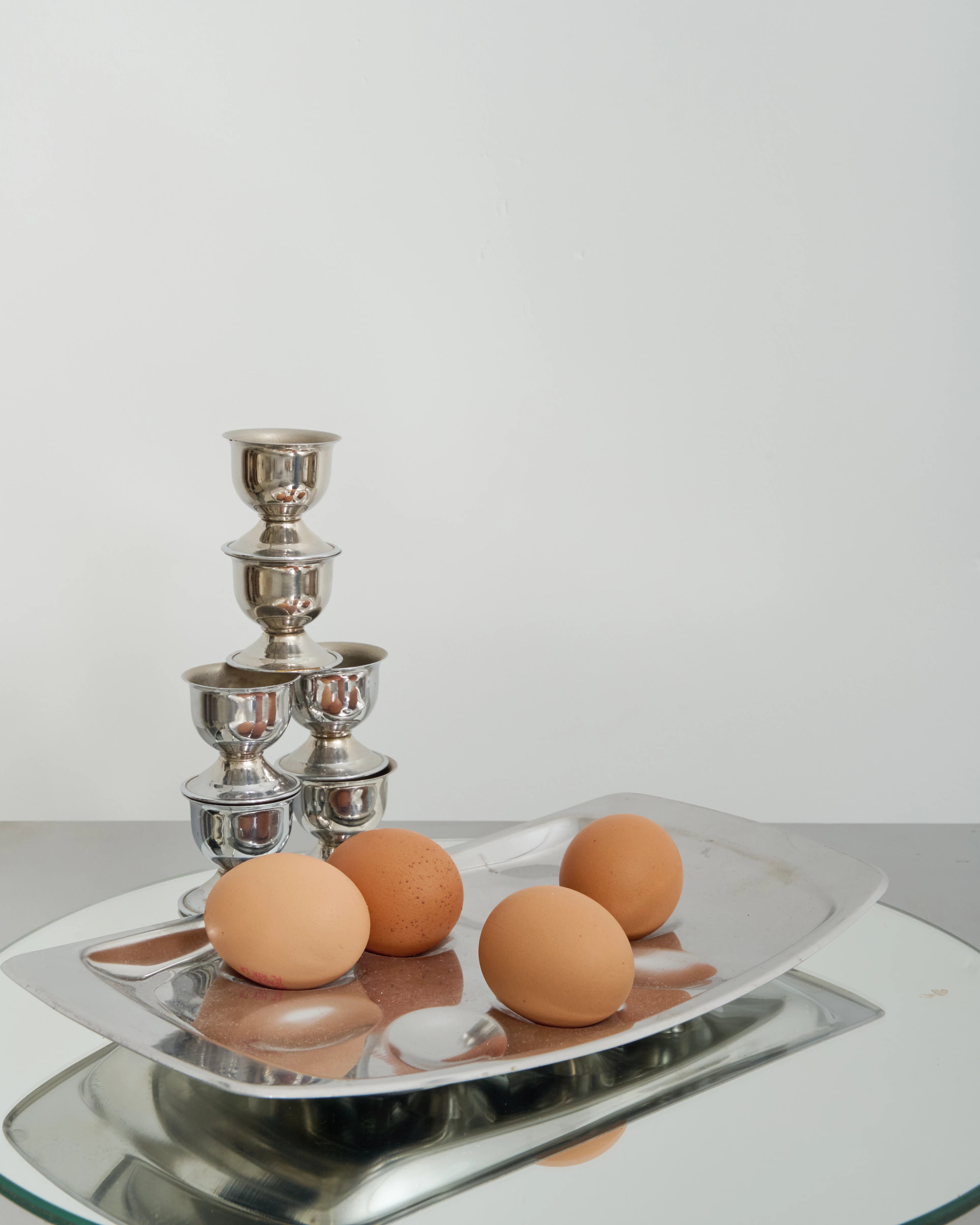 Stainless steel egg stand and egg cups
