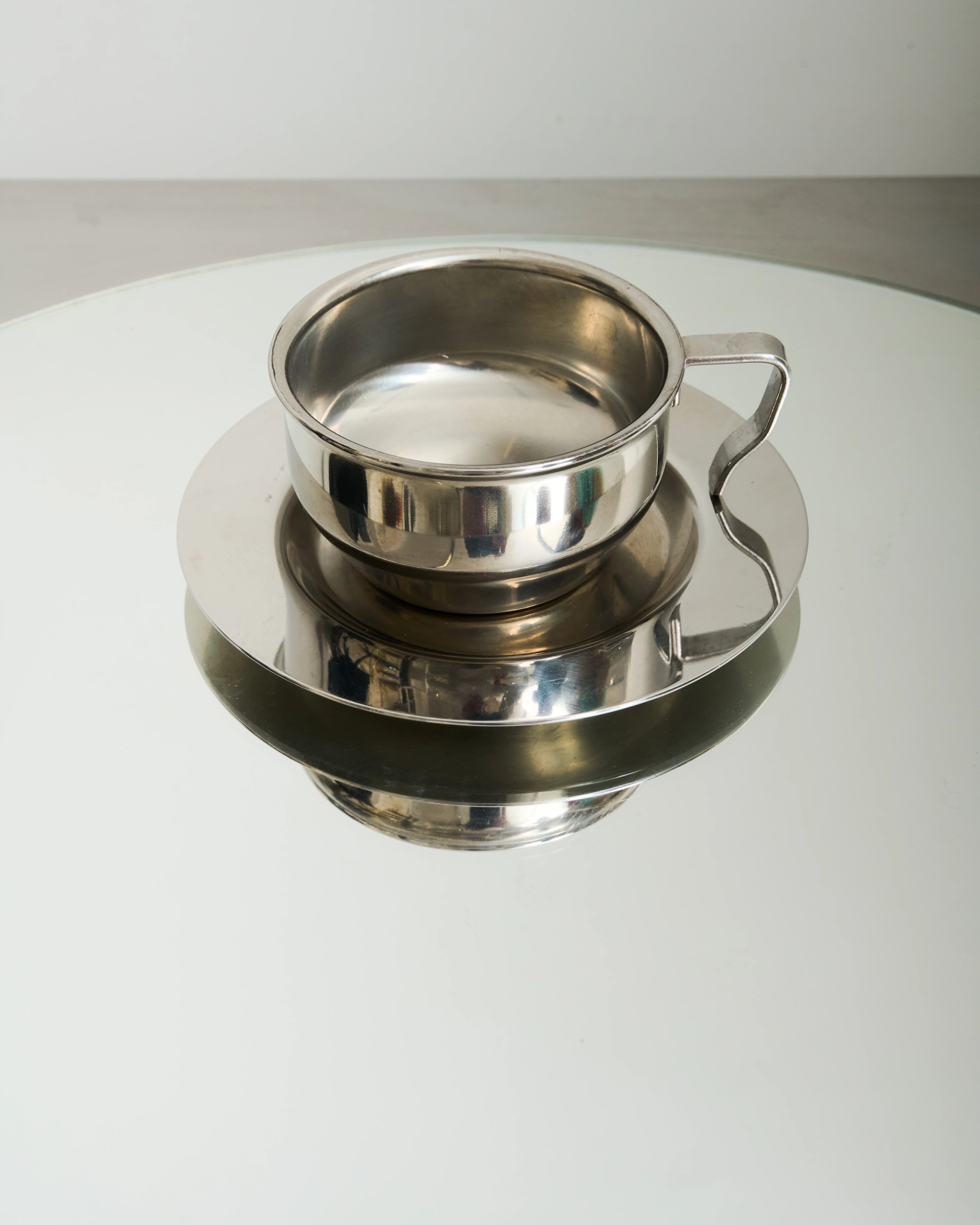 Six stainless steel bowl-shaped cups, 1980