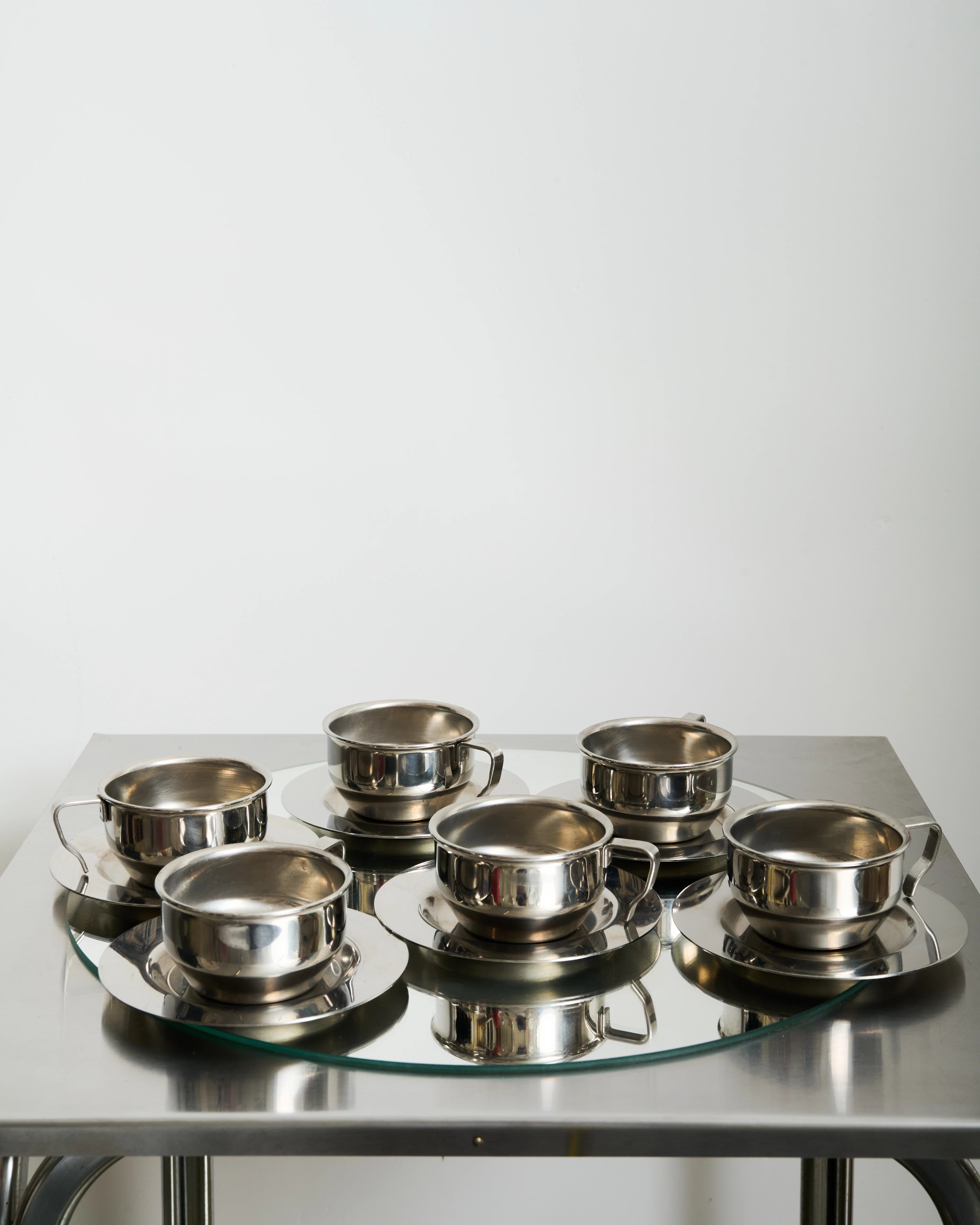 Six stainless steel bowl-shaped cups, 1980