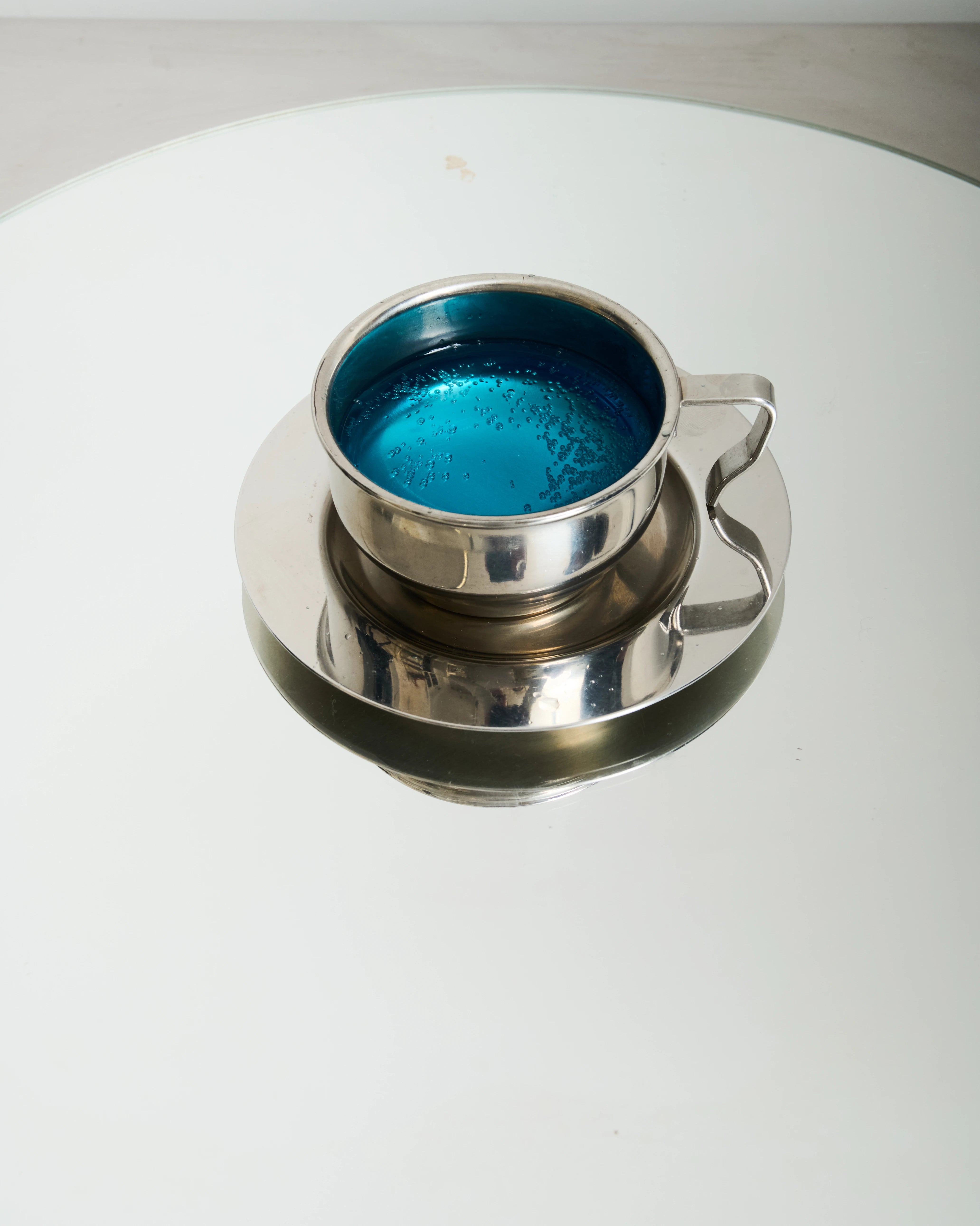 Six stainless steel bowl-shaped cups, 1980