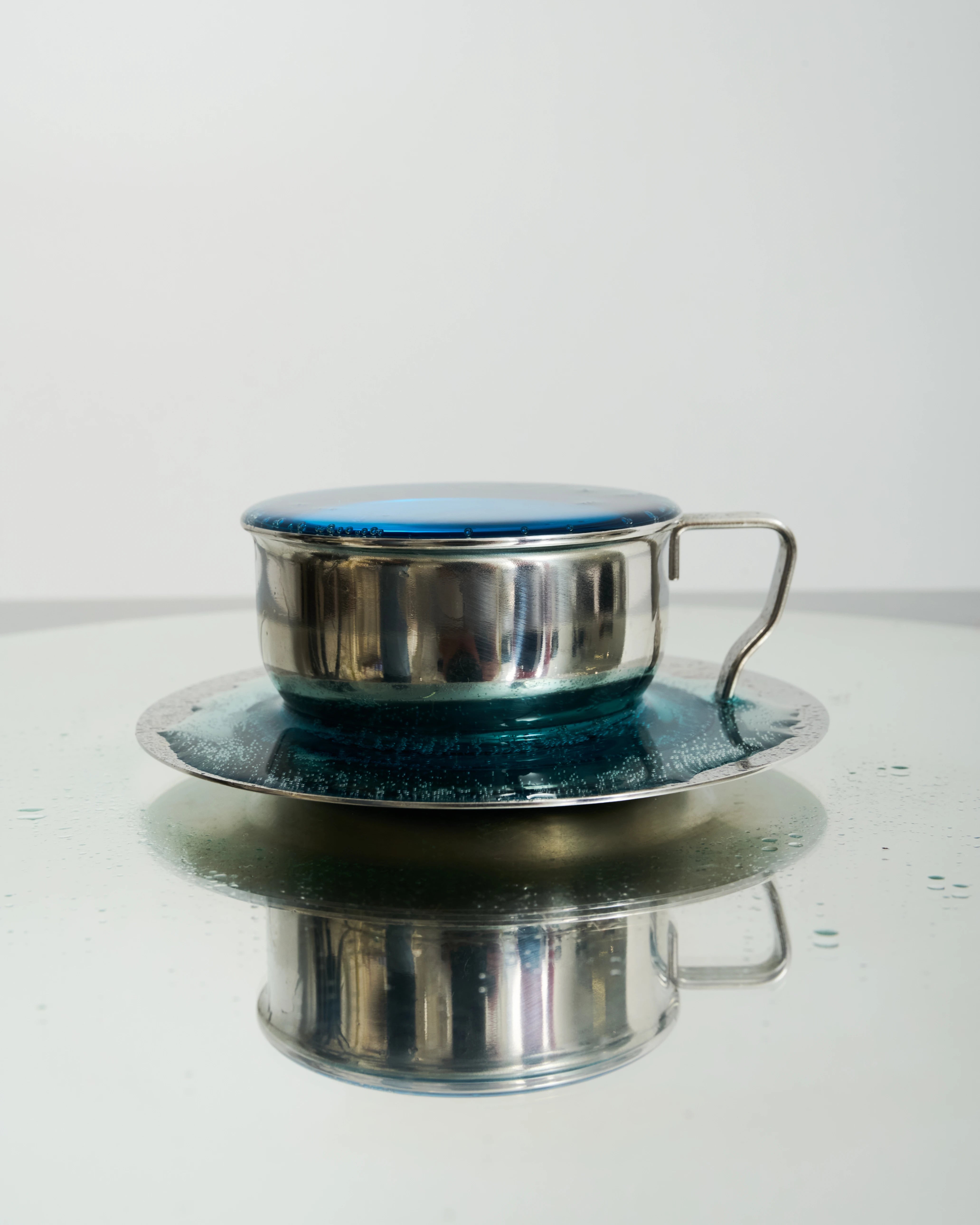 Six stainless steel bowl-shaped cups, 1980