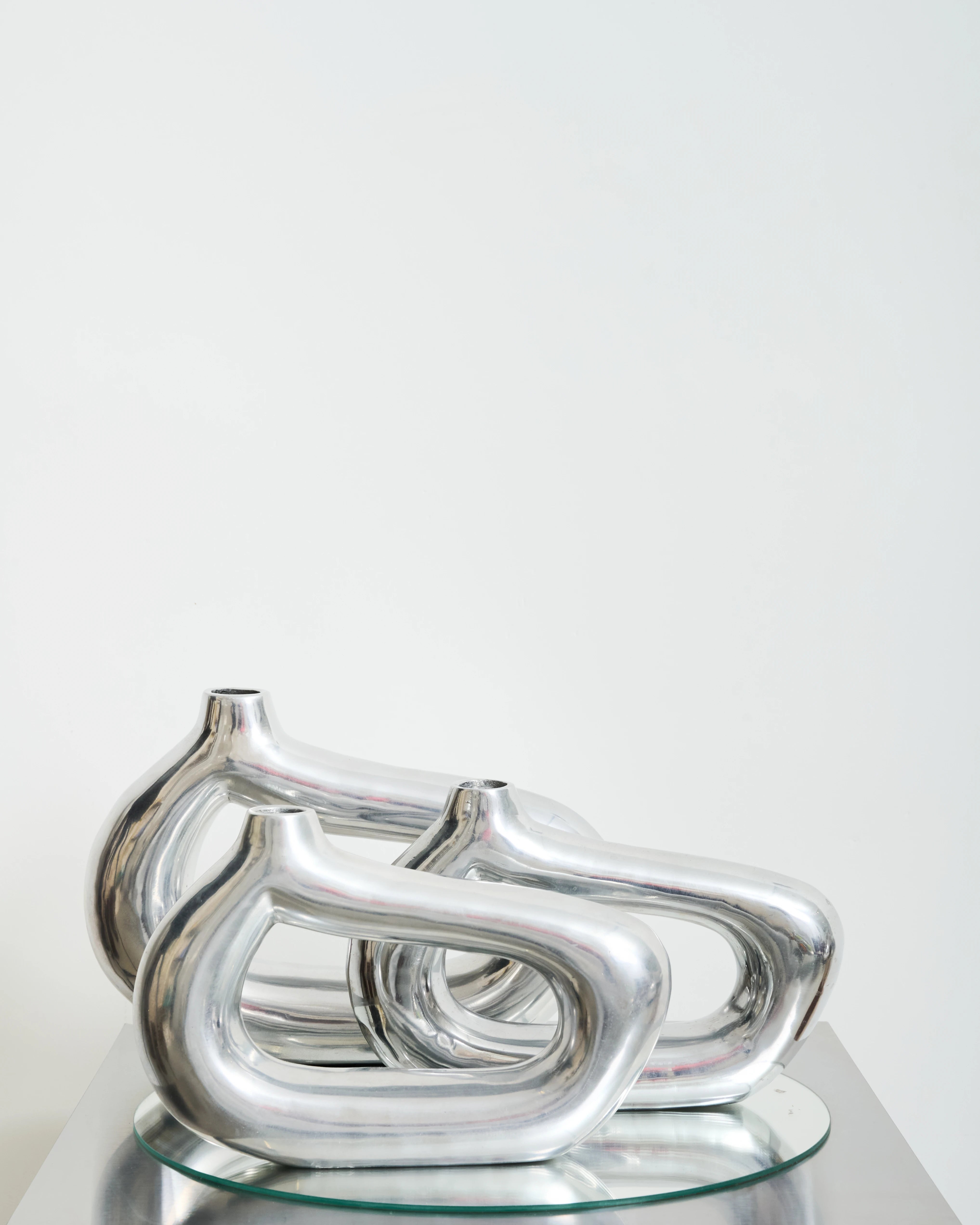 Freeform cast aluminum vase (small), 1970s