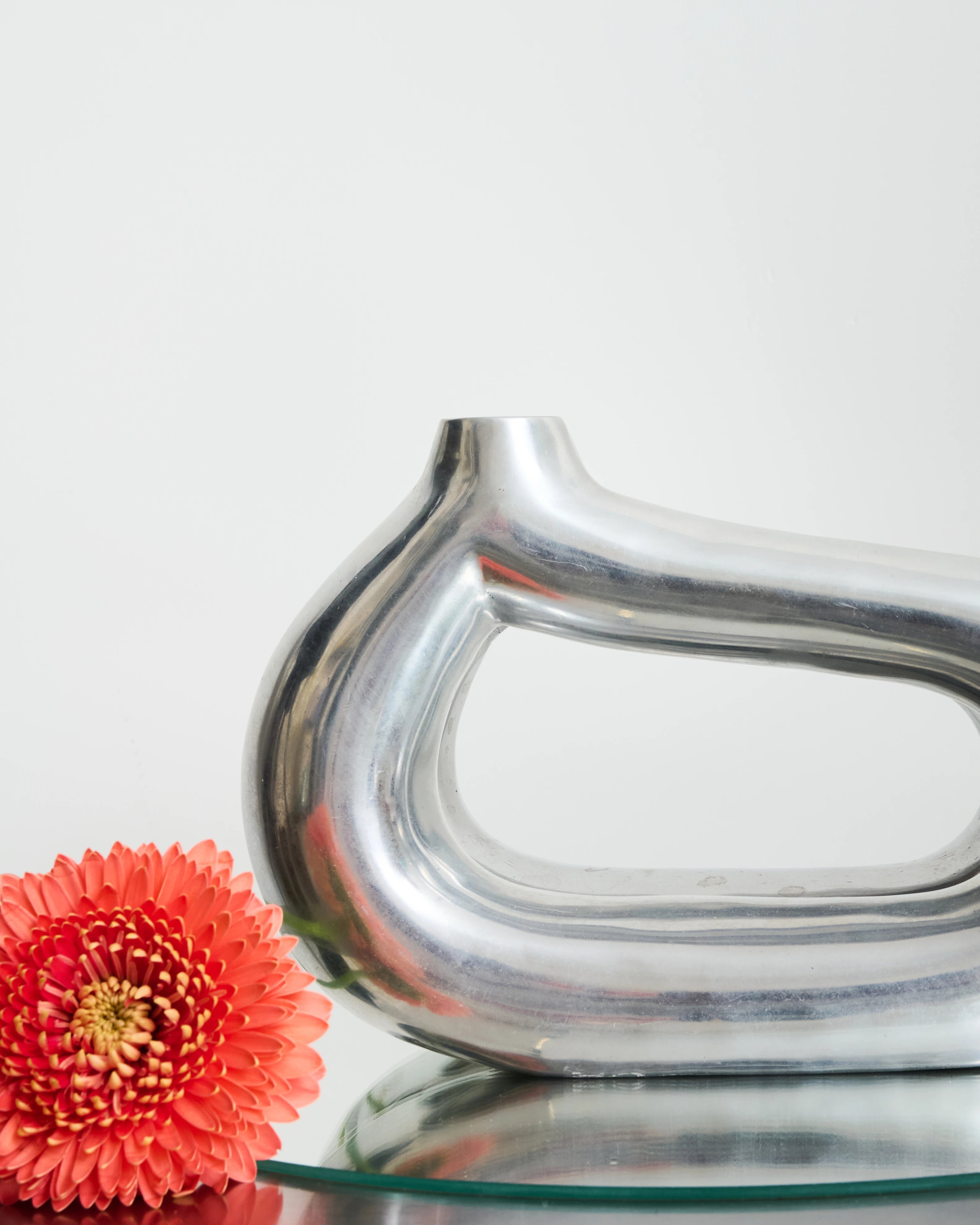 Freeform cast aluminum vase (small), 1970s