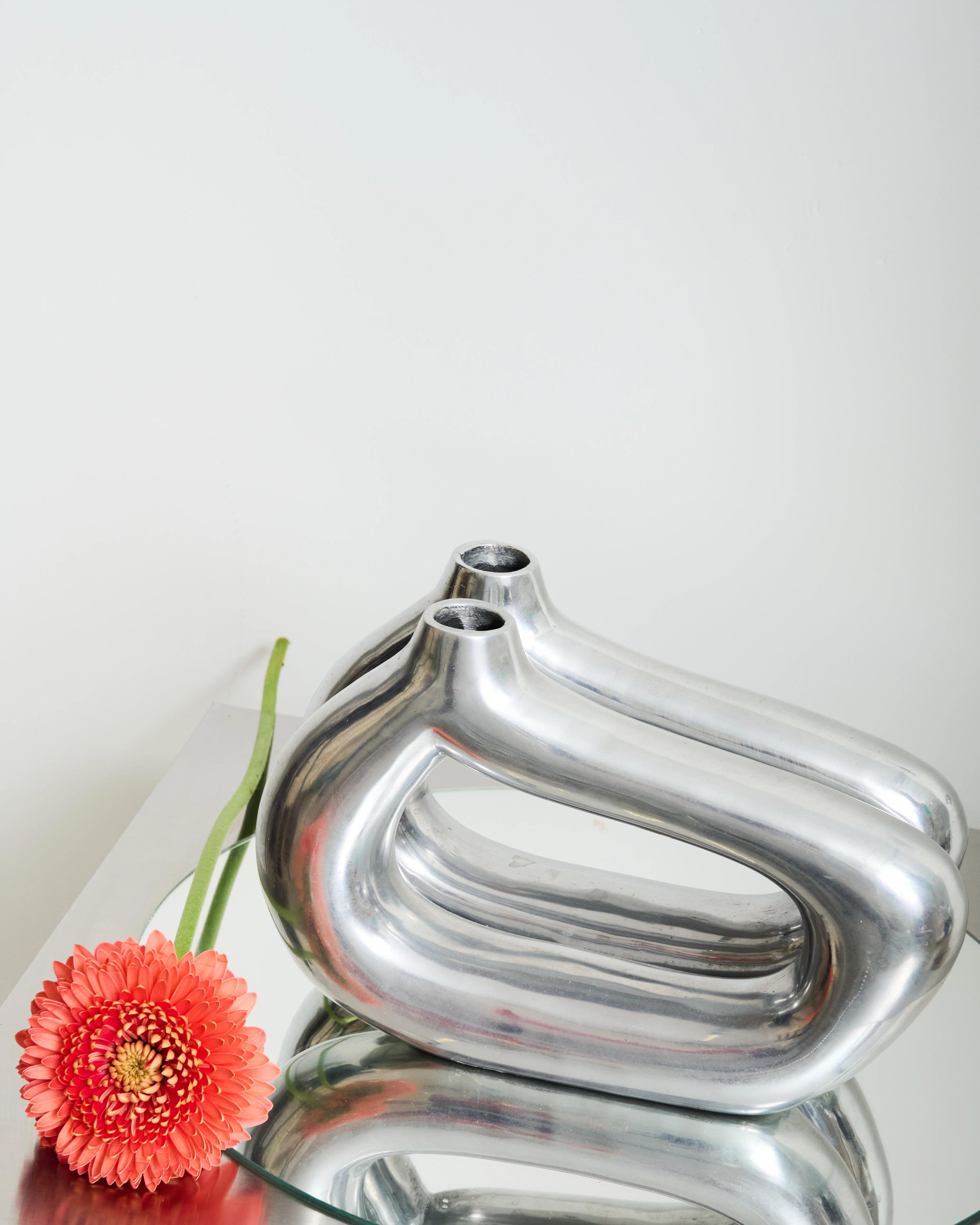 Freeform cast aluminum vase (small), 1970s