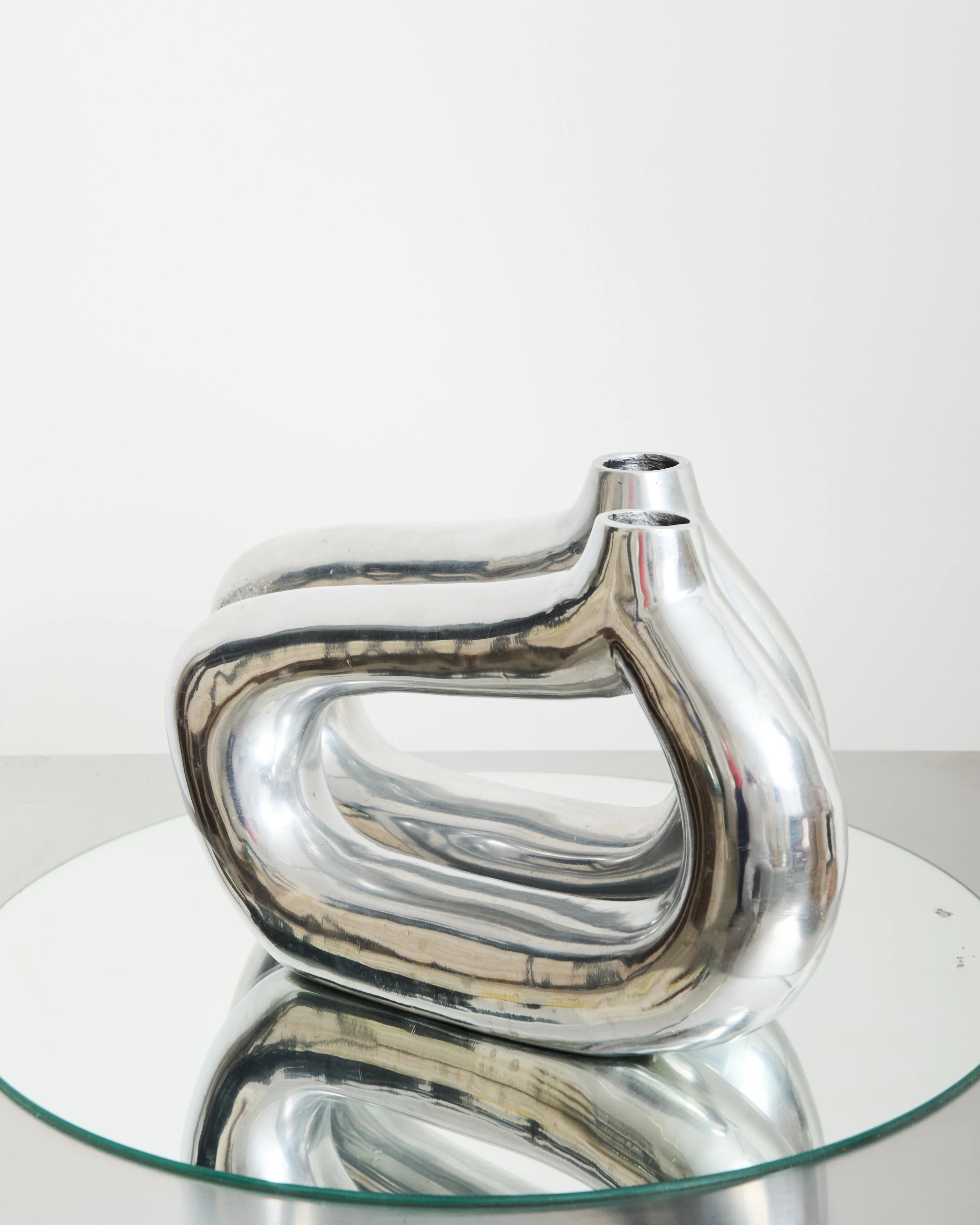 Freeform cast aluminum vase (small), 1970s