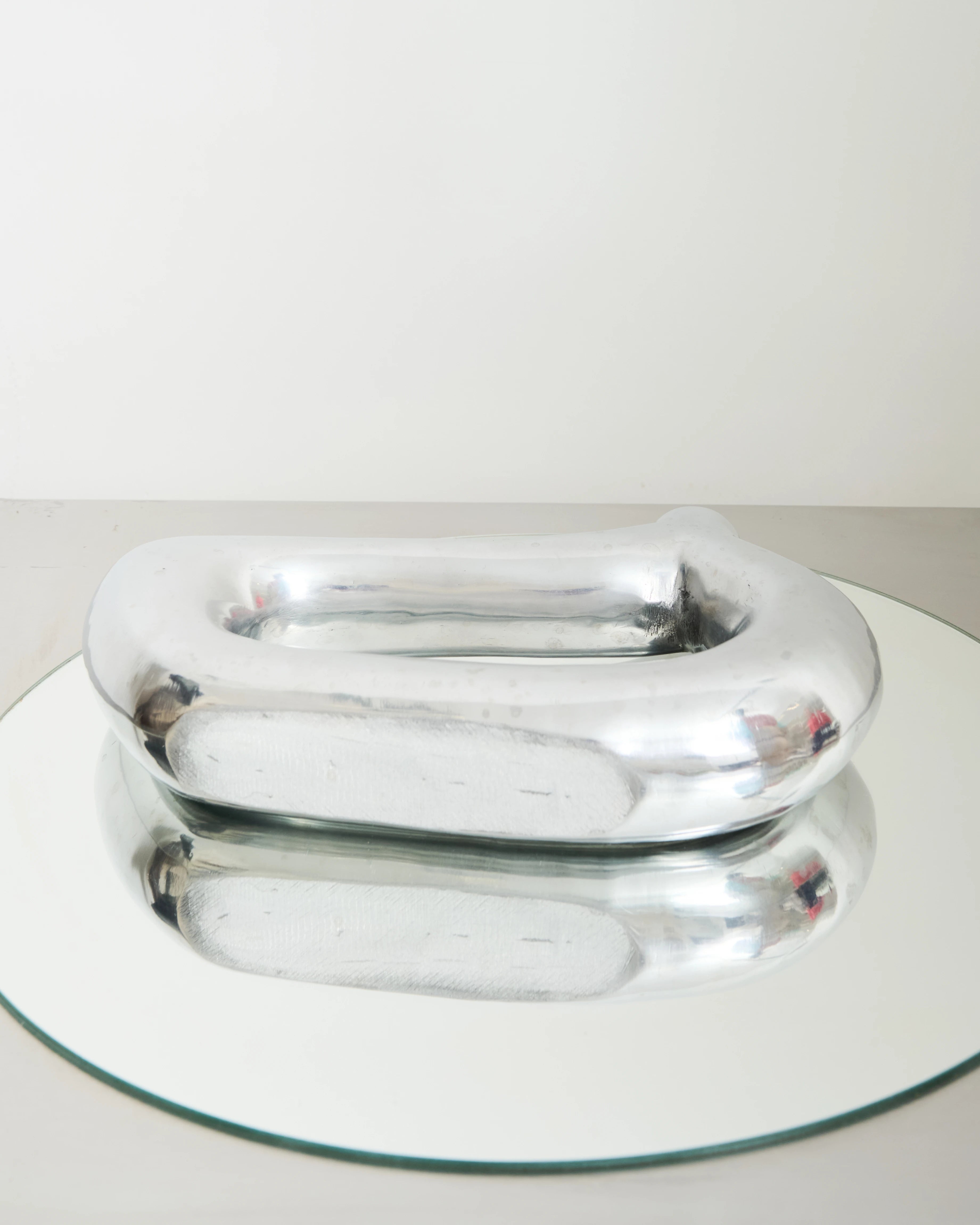 Freeform cast aluminum vase (small), 1970s