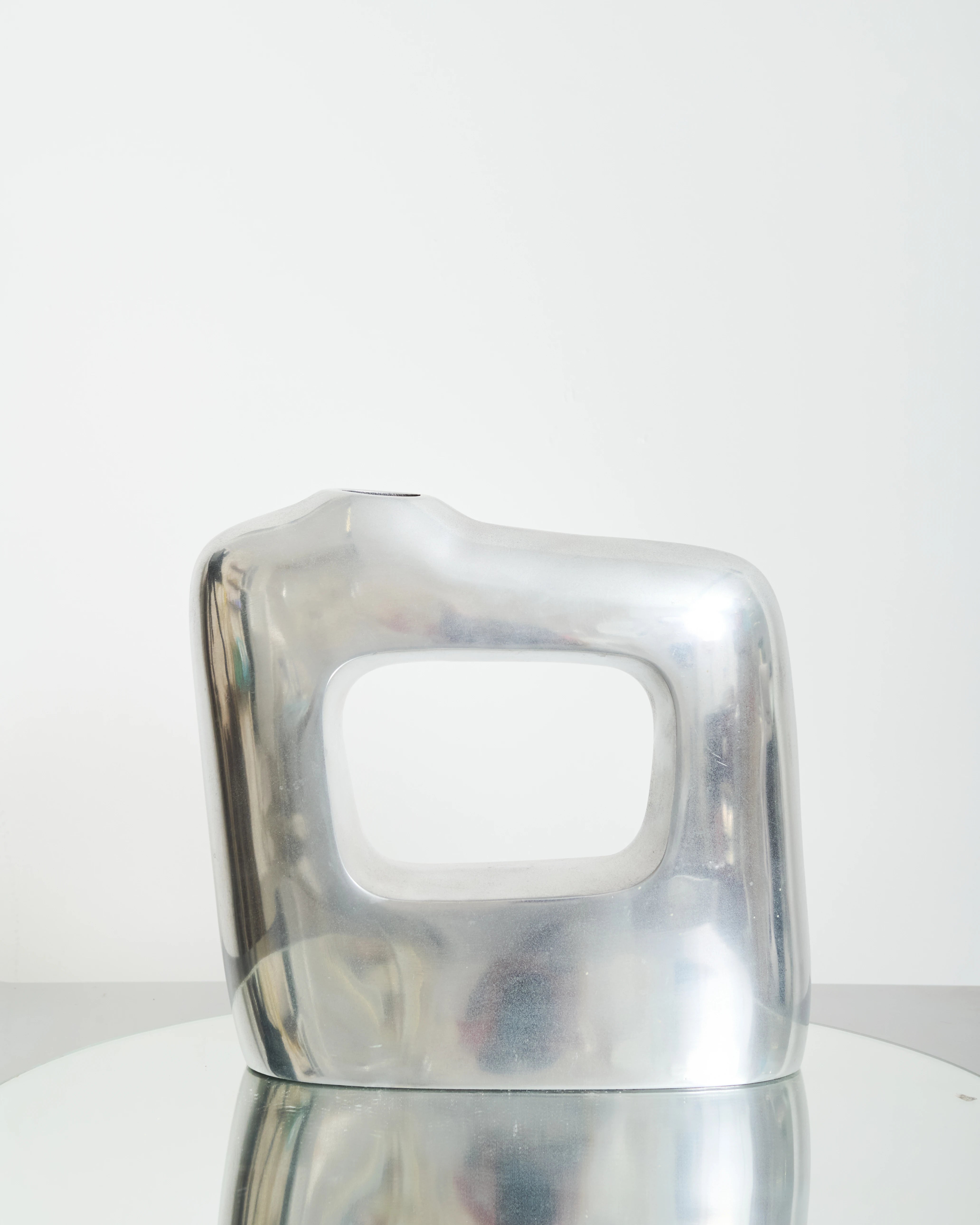 “Round” cast aluminum vase, 1970s