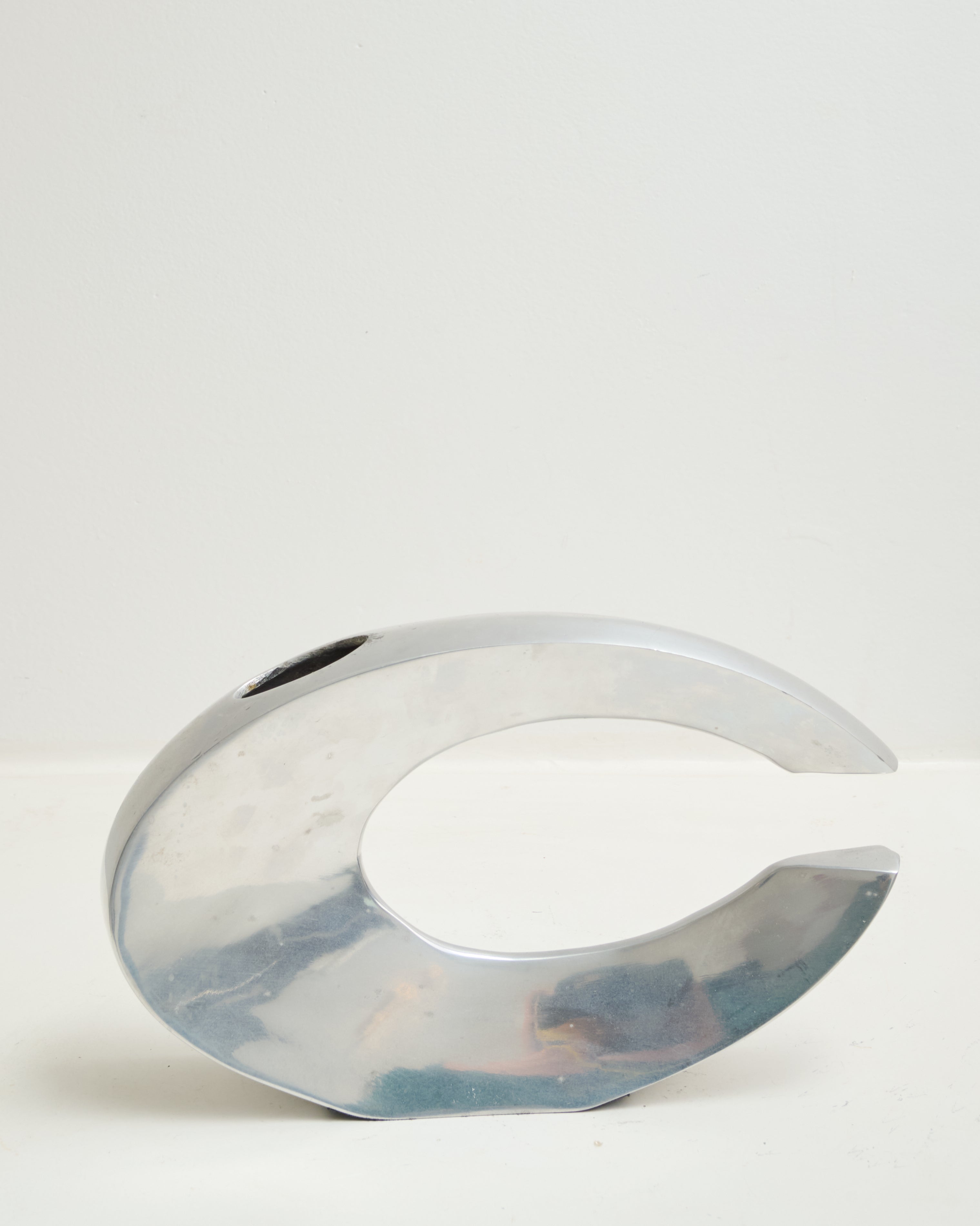 Cast aluminum vase in "C" shape, space age, 1970-1980
