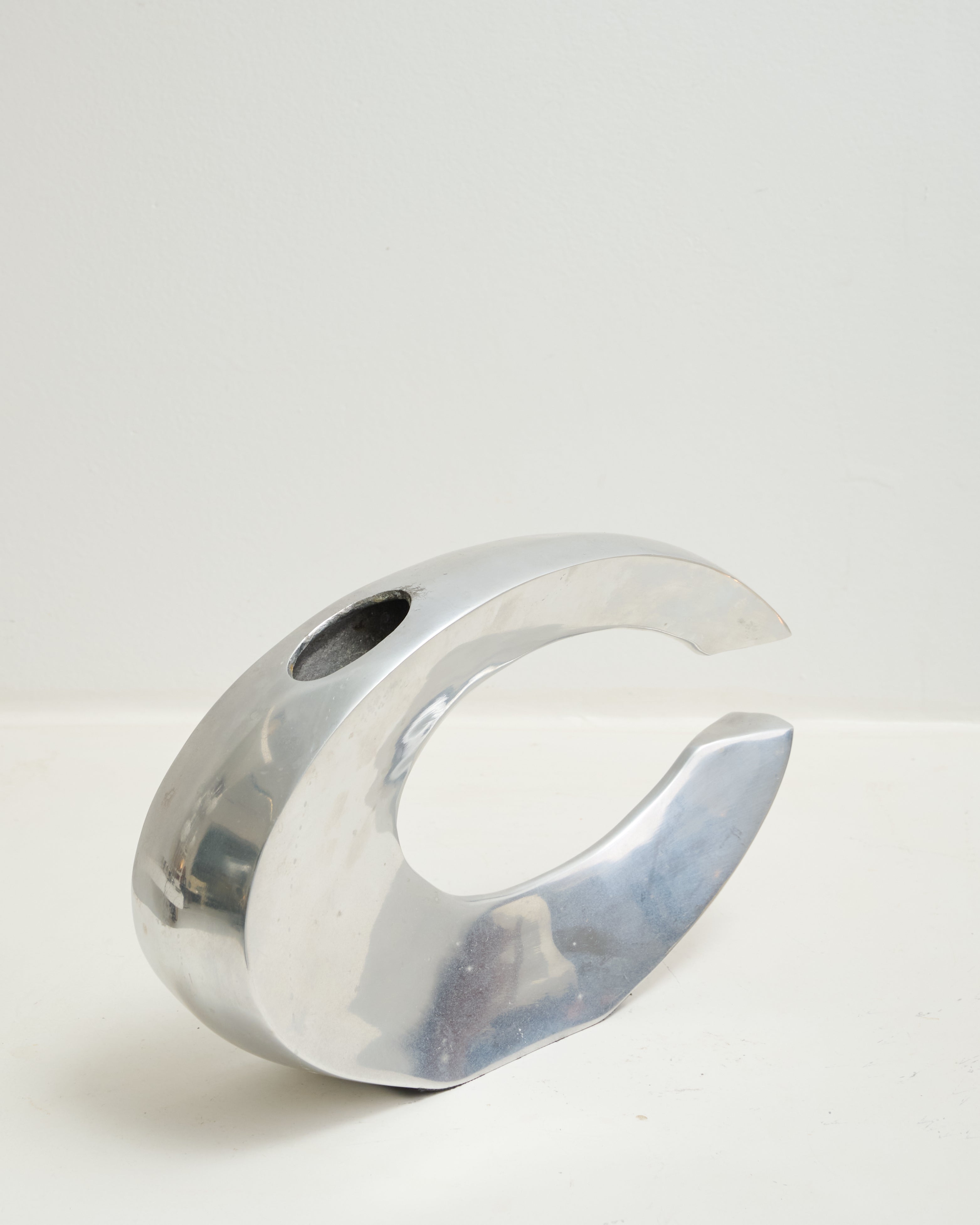 Cast aluminum vase in "C" shape, space age, 1970-1980