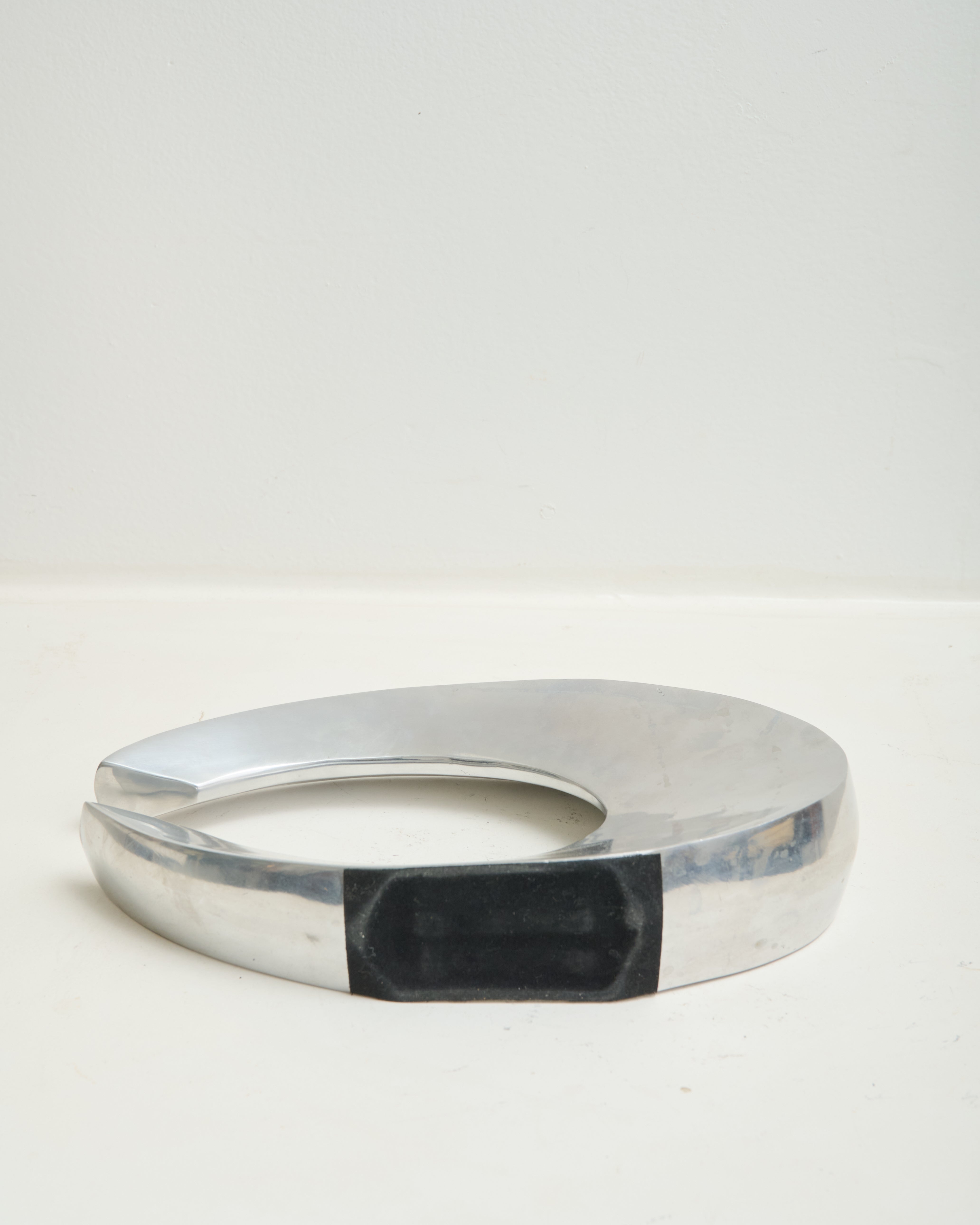 Cast aluminum vase in "C" shape, space age, 1970-1980