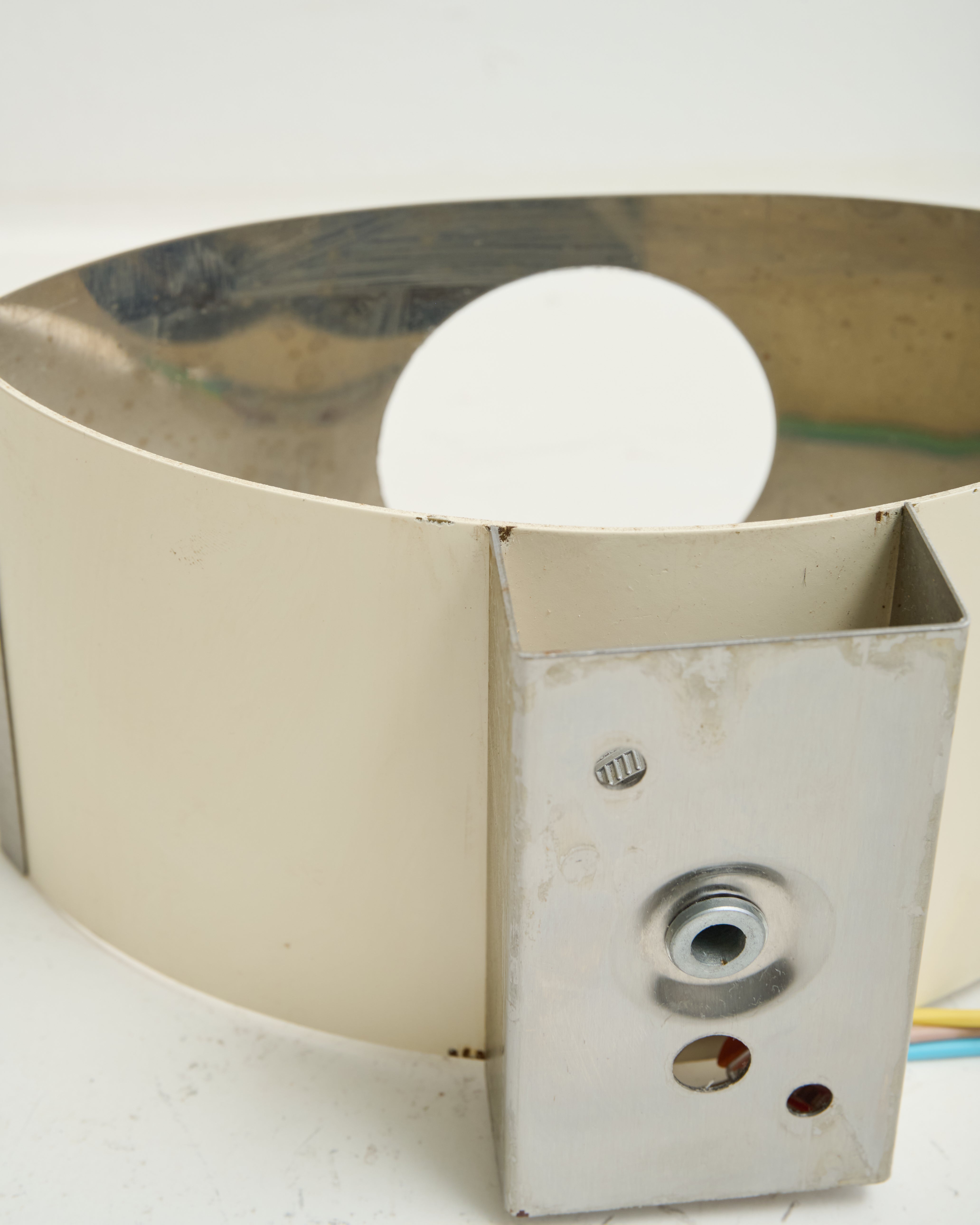 Brushed aluminum wall light, white background, 1970