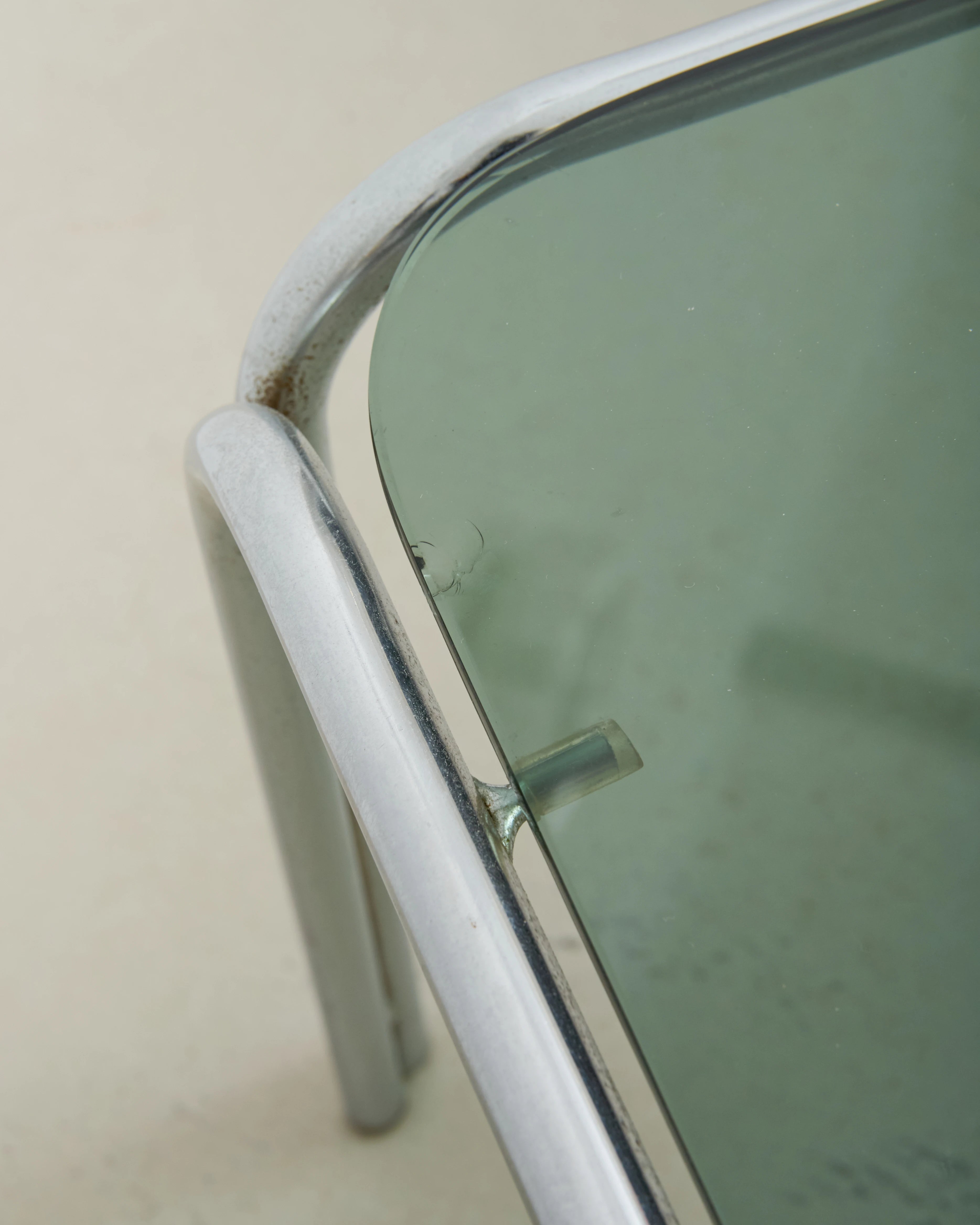 Coffee table with chrome legs and corners