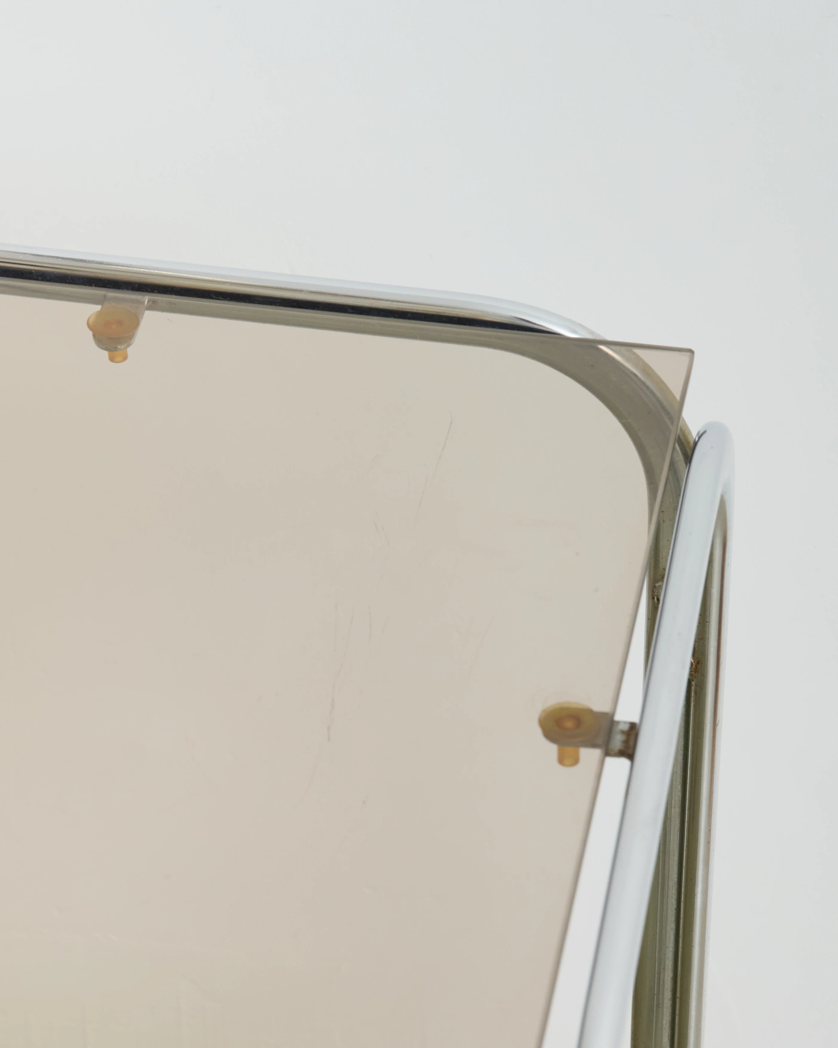 Coffee table with chrome legs and corners