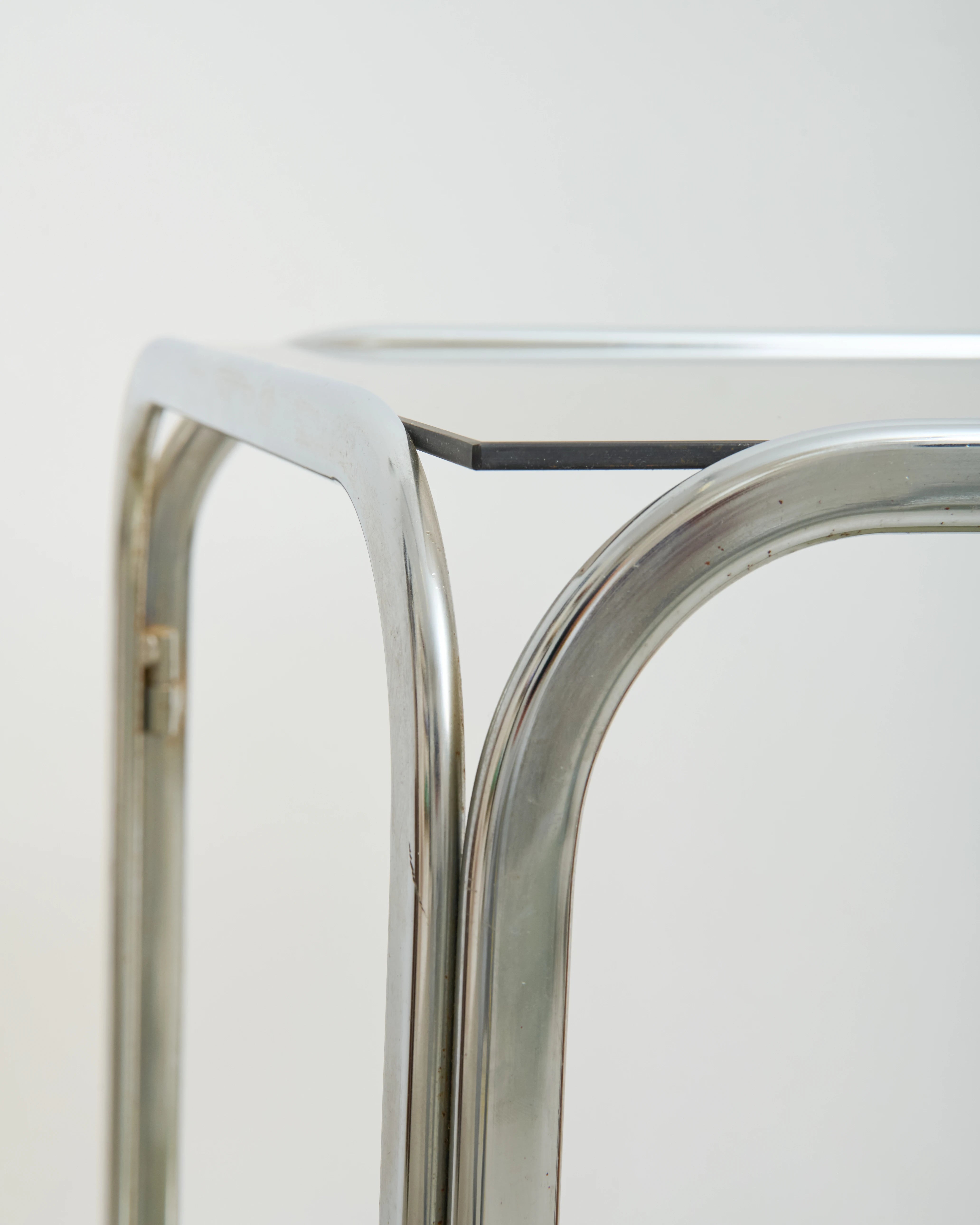 Coffee table with chrome legs and corners